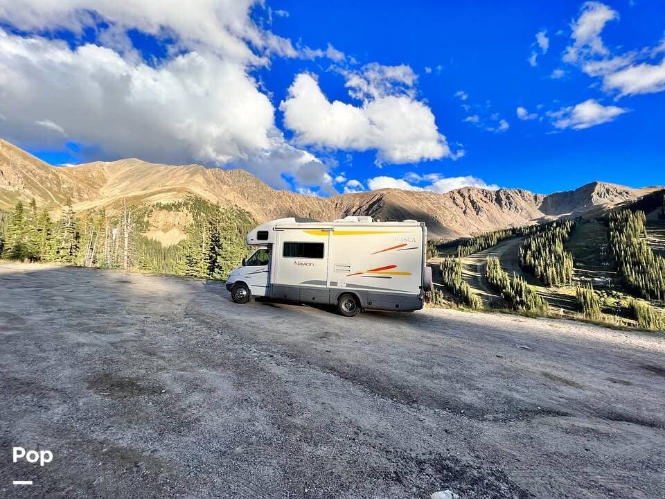 2006 Itasca Navion 23J - Used Class C For Sale by Pop RVs in Boulder, Colorado features Generator, Awning, Slideout, Leveling Jacks, Air Conditioning