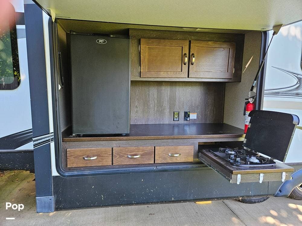 2018 Keystone Outback 330RL - Used Travel Trailer For Sale by Pop RVs in Clarksville, Tennessee features Awning, Air Conditioning, Leveling Jacks, Slideout