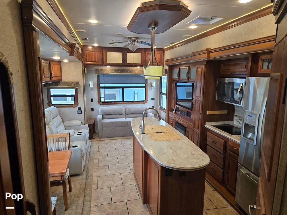 2016 CrossRoads Redwood 3901 MB - Used Fifth Wheel For Sale by Pop RVs in Seminole, Florida features Slideout, Awning, Leveling Jacks, Air Conditioning