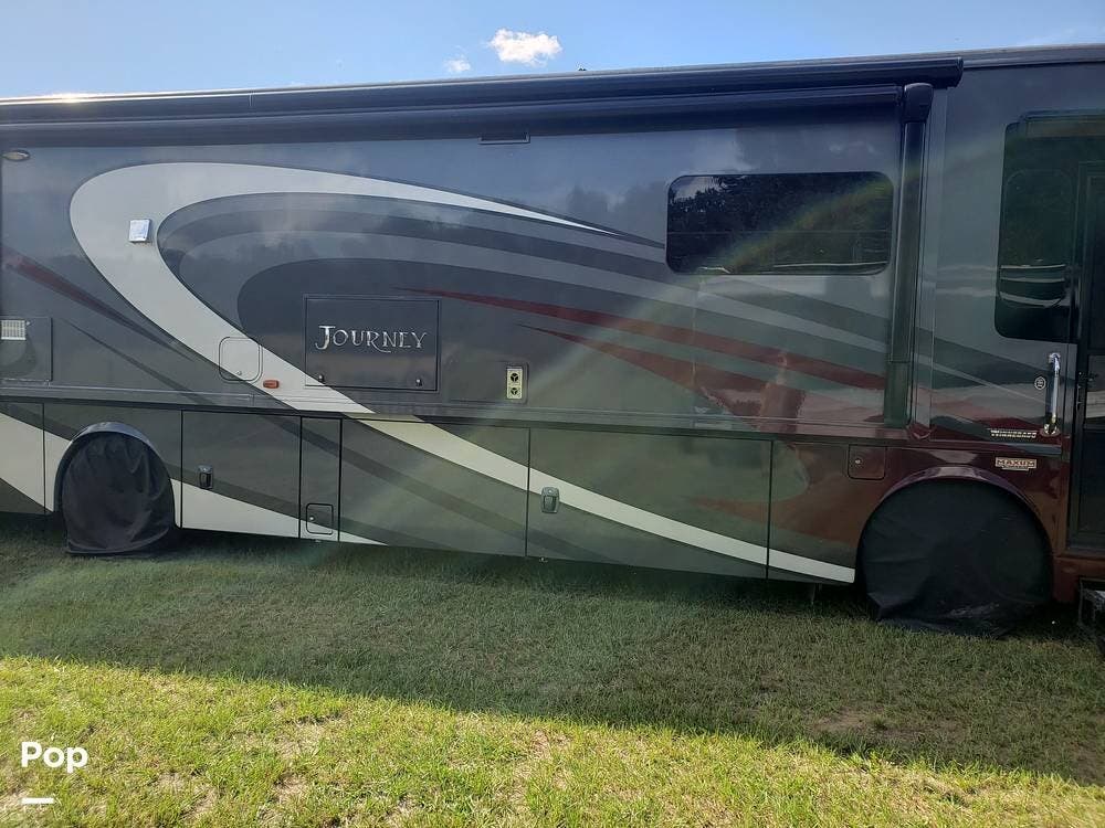 2017 Winnebago Journey 36M - Used Diesel Pusher For Sale by Pop RVs in Bushnell, Florida features Awning, Leveling Jacks, Air Conditioning, Slideout, Generator