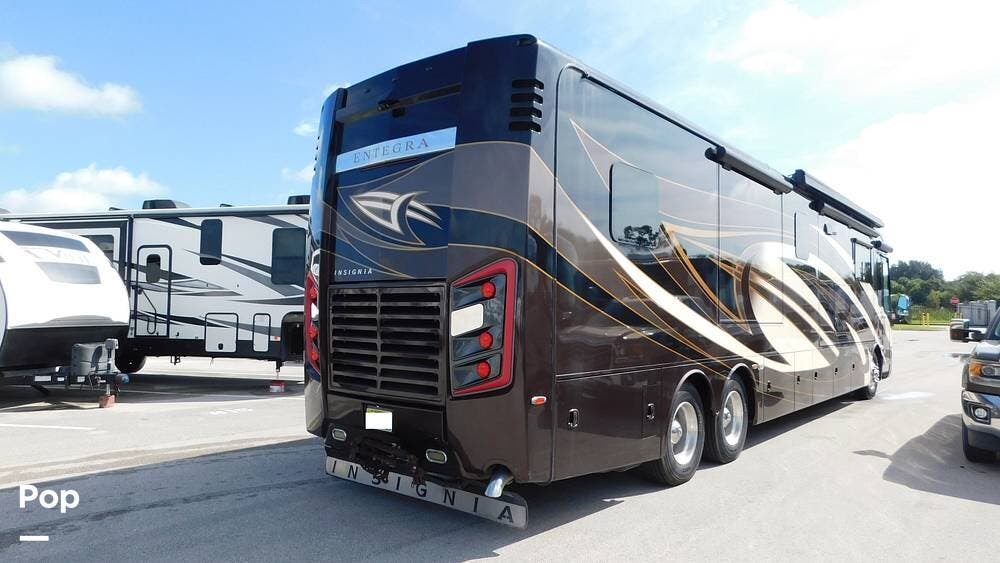 2017 Entegra Coach Insignia 44w - Used Diesel Pusher For Sale by Pop RVs in Fort Pierce, Florida features Air Conditioning, Awning, Generator, Slideout