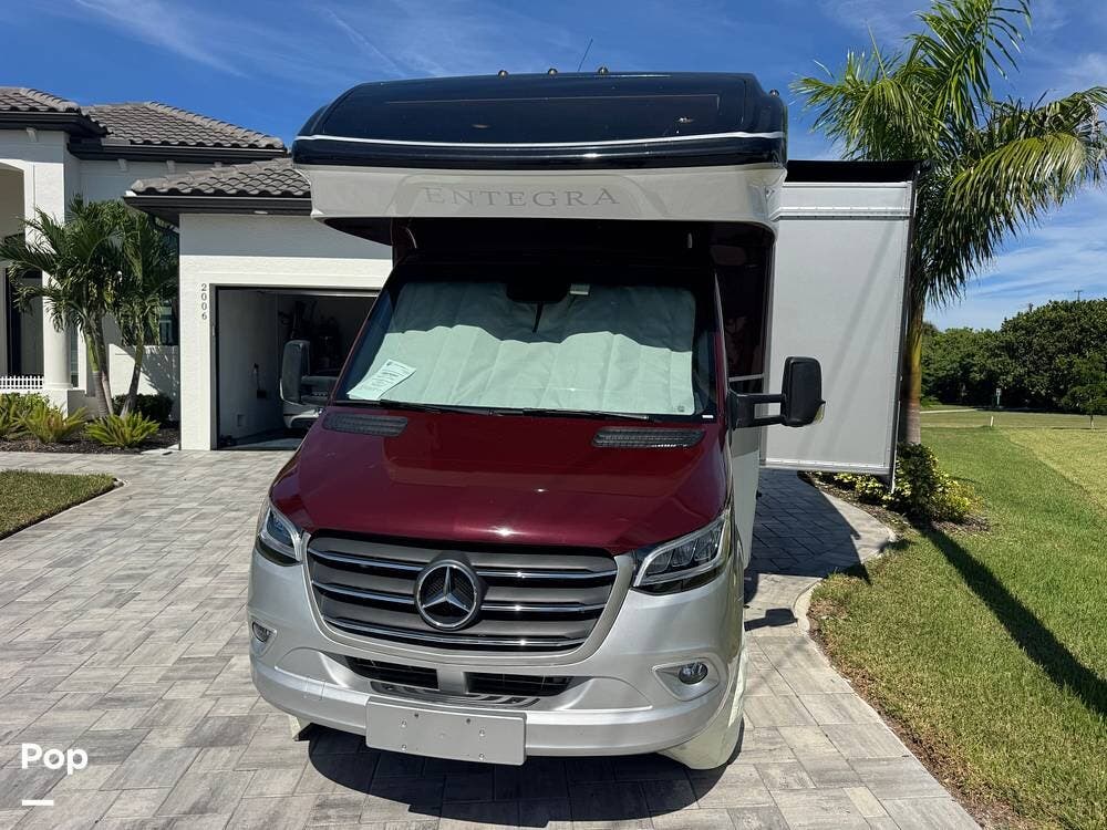 2023 Entegra Coach Qwest 24R - Used Class C For Sale by Pop RVs in Punta Gorda, Florida features Air Conditioning, Leveling Jacks, Slideout, Generator