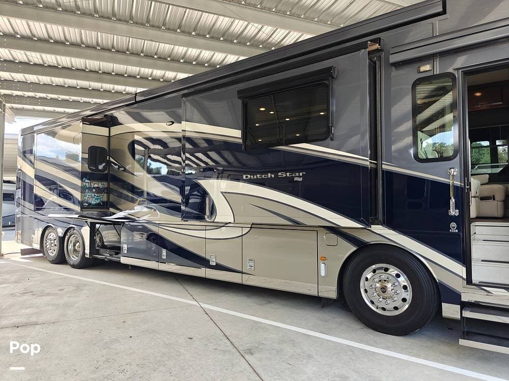 2020 Newmar Dutch Star 4328 - Used Diesel Pusher For Sale by Pop RVs in Wildwood, Florida features Slideout, Leveling Jacks, Generator, Awning, Air Conditioning