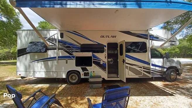 2021 Thor Motor Coach Outlaw 29J - Used Toy Hauler For Sale by Pop RVs in Debary, Florida features Slideout