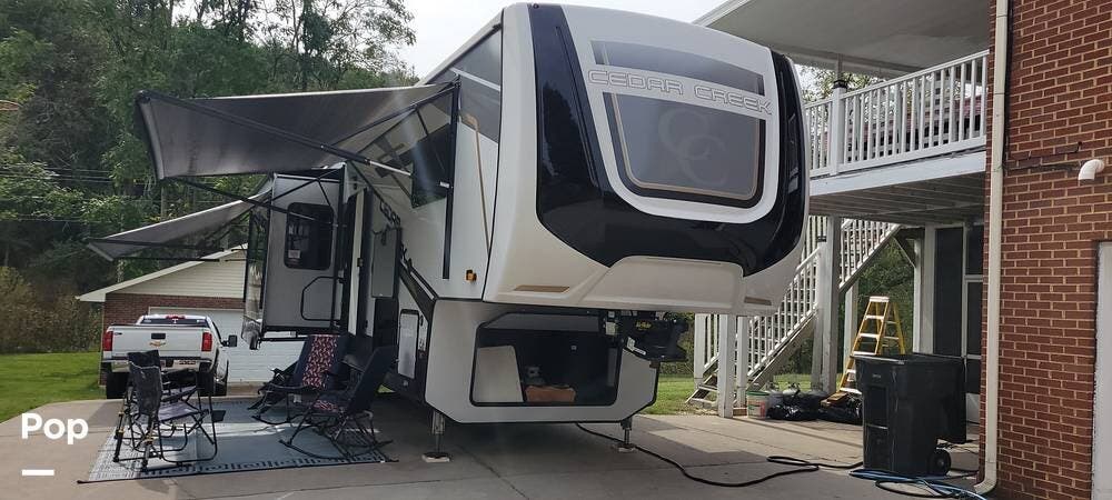 2021 Forest River Cedar Creek 360RL - Used Fifth Wheel For Sale by Pop RVs in Morristown, Tennessee features Leveling Jacks, Air Conditioning, Awning, Slideout