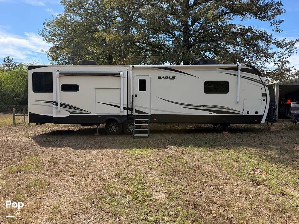 2021 Jayco Eagle 332CBOK - Used Travel Trailer For Sale by Pop RVs in Gilmer, Texas features Air Conditioning, Slideout, Awning