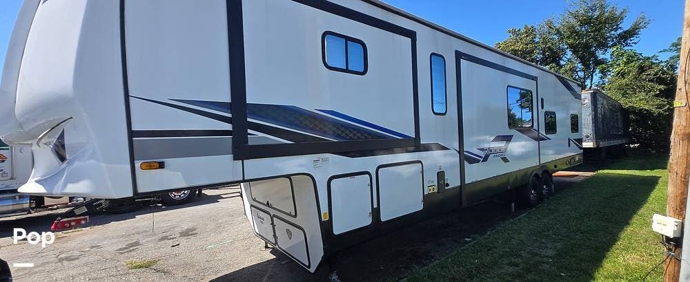2023 Forest River Rogue 4007G2 - Used Toy Hauler For Sale by Pop RVs in Parsippany, New Jersey features Leveling Jacks, Generator, Slideout, Awning, Air Conditioning