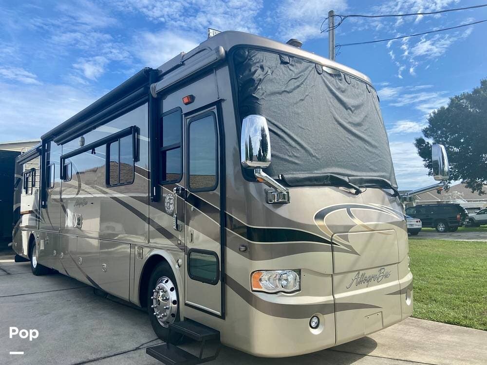 2007 Tiffin Allegro Bus 40QDP - Used Diesel Pusher For Sale by Pop RVs in Lake Wales, Florida features Leveling Jacks, Awning, Air Conditioning, Slideout, Generator