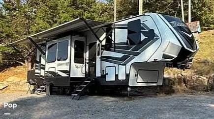2022 Grand Design Momentum 351M - Used Toy Hauler For Sale by Pop RVs in Baxter, Tennessee features Slideout, Awning, Air Conditioning, Leveling Jacks