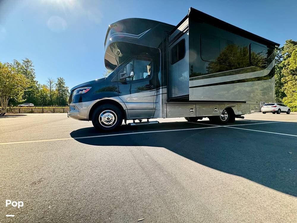 2022 Renegade RV Vienna 25RMC - Used Class C For Sale by Pop RVs in Fort Mill, South Carolina features Leveling Jacks, Awning, Generator, Air Conditioning, Slideout