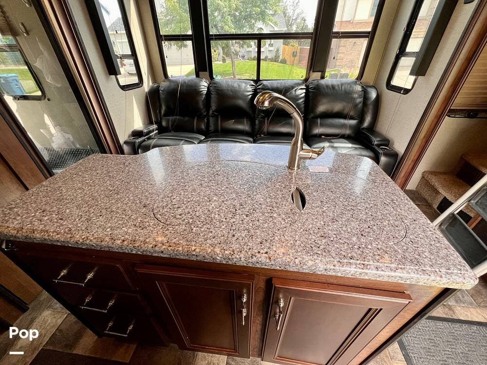 2016 Keystone Fuzion 385 - Used Toy Hauler For Sale by Pop RVs in Colorado Springs, Colorado features Slideout, Generator, Air Conditioning, Awning