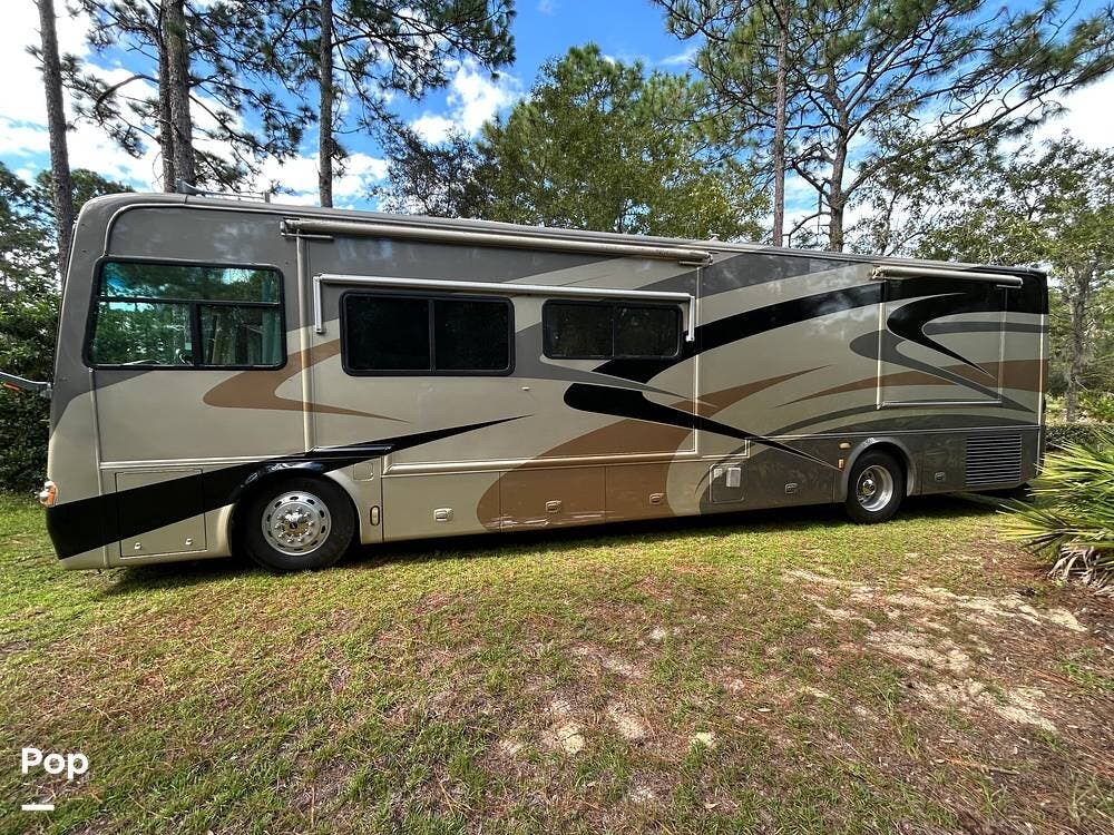 2005 Tiffin Allegro Bus 38TGP - Used Diesel Pusher For Sale by Pop RVs in Beverly Hills, Florida features Generator, Air Conditioning, Slideout, Awning