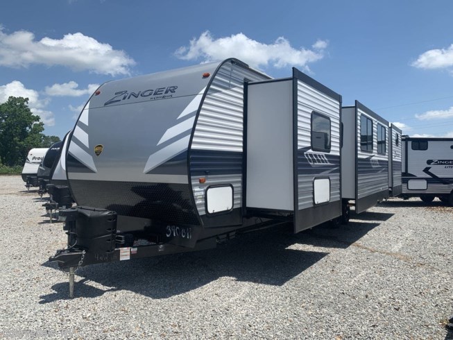 2020 CrossRoads Zinger ZR340BH - Used Travel Trailer For Sale by Courvelle&#39;s RV in Opelousas, Louisiana features Leather Furniture, CO Detector, Microwave, Refrigerator, Bunk Beds
