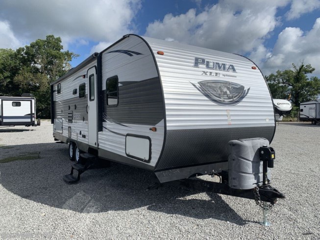 2016 Palomino Puma XLE 27RBSC - Used Travel Trailer For Sale by Courvelle&#39;s RV in Opelousas, Louisiana features Toilet, Medicine Cabinet, Refrigerator, Roof Vent, Propane