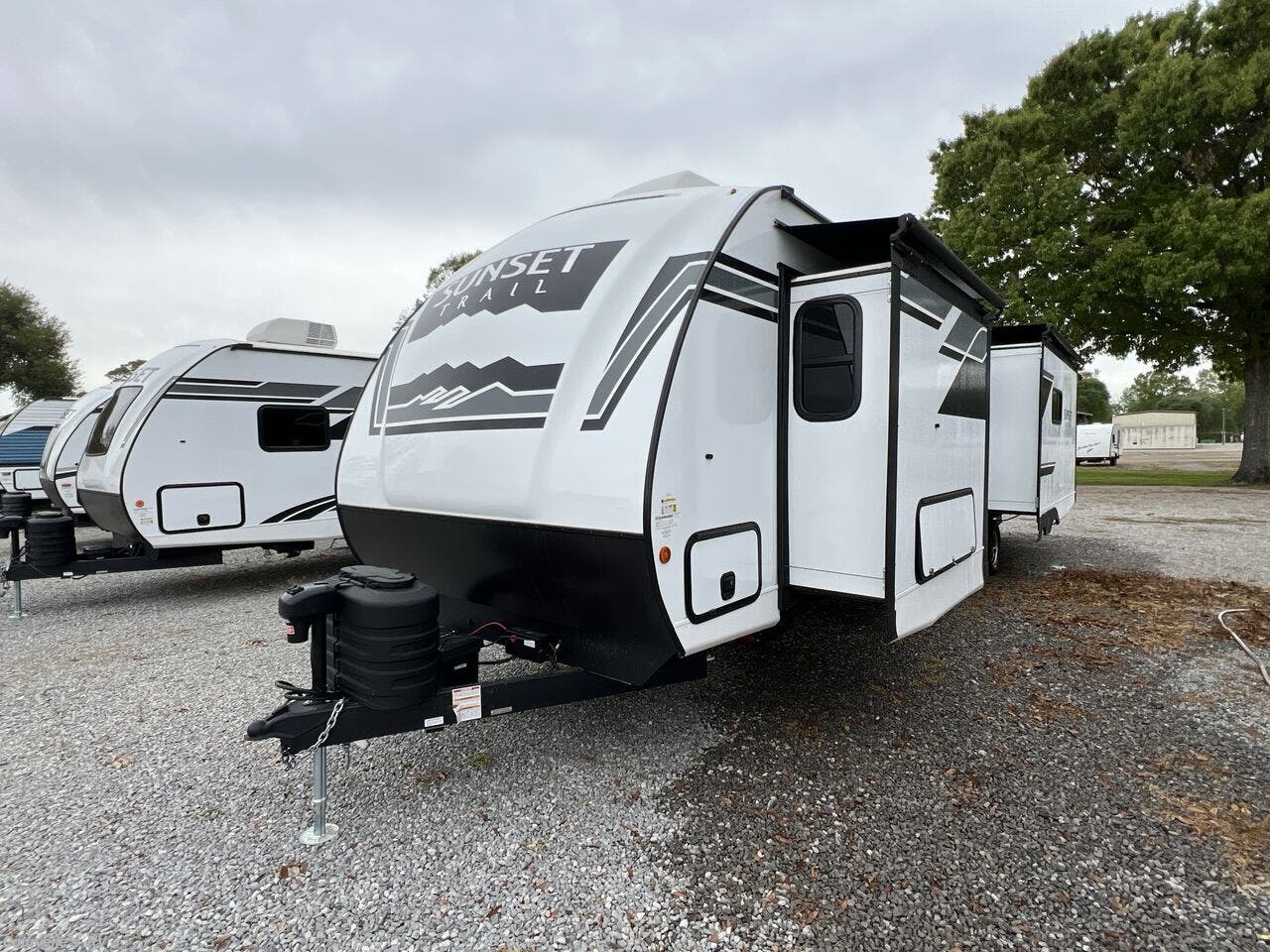 2025 CrossRoads Sunset Trail Super Lite SS330SI - New Travel Trailer For Sale by Courvelle's RV in Opelousas, Louisiana features Washer/Dryer Prep, Solar Panel, Solid Surface Countertops, Power Stabilizer Jacks, LP Detector
