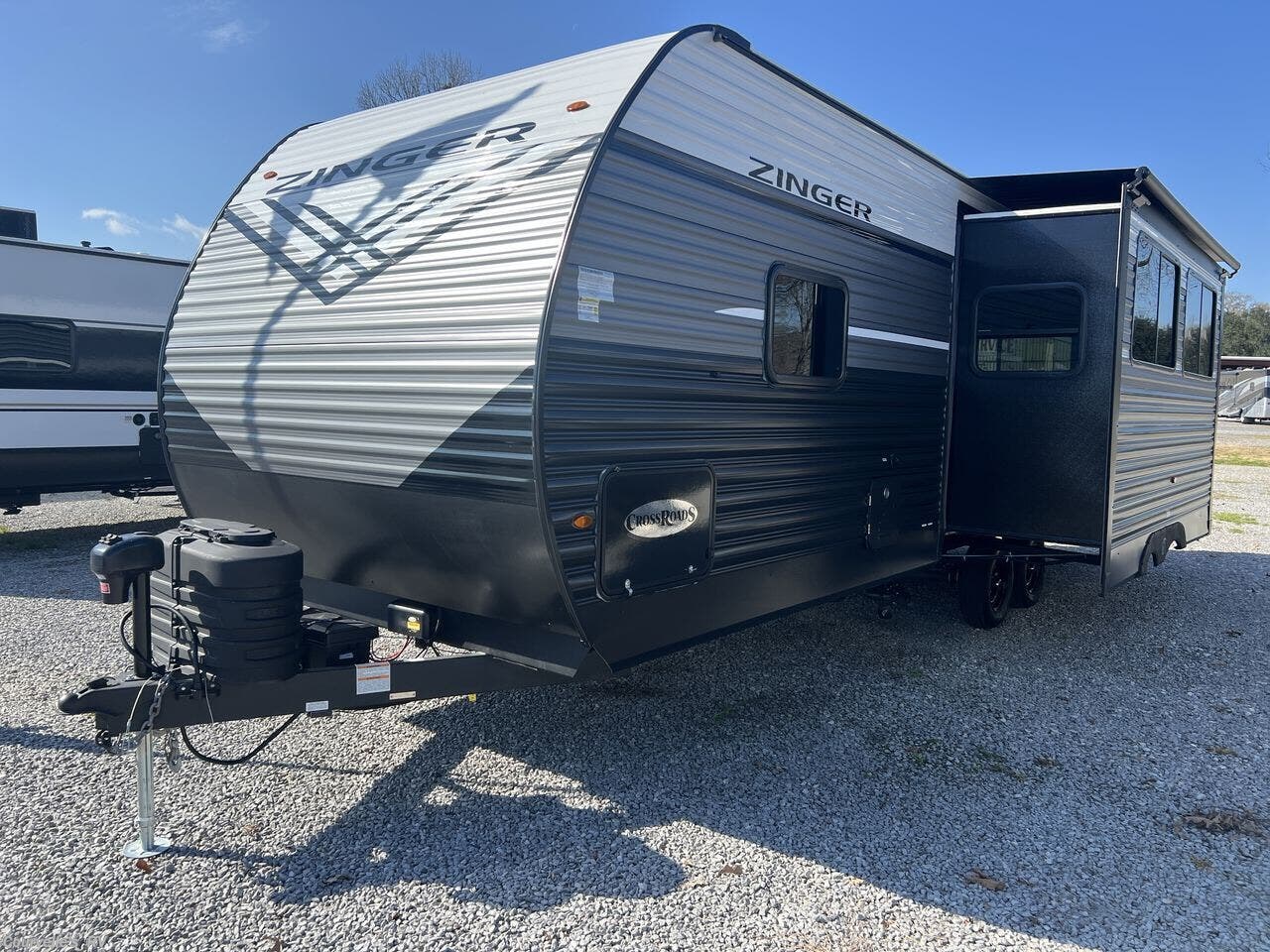 2026 CrossRoads Zinger 260RL - New Travel Trailer For Sale by Courvelle's RV in Opelousas, Louisiana features Second Roof A/C, Power Hitch Jack, 50 Amp Service, Power Awning, Solar Panel
