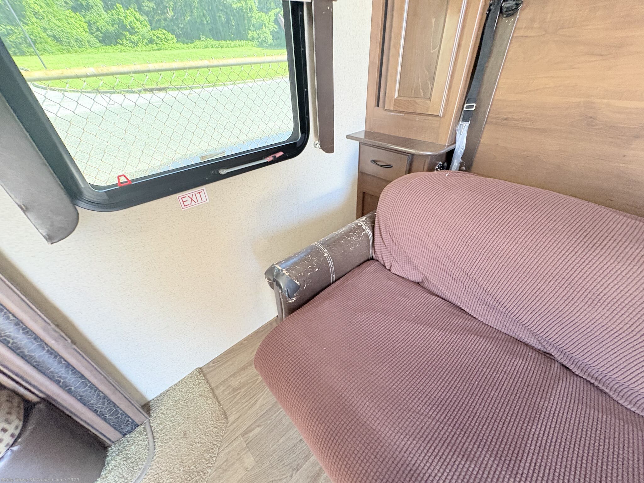 please see photos for wear on Tri-Fold Sofa * Does has a sofa cover on it , but photos do show signs of wear on the arm rest on both sides. Sold As is... 