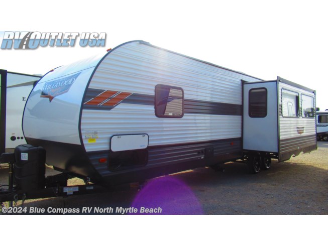 2022 Forest River Wildwood 27RK - New Travel Trailer For Sale by RV Outlet USA of NMB in Longs, South Carolina features Auxiliary Battery, Air Conditioning, Booth Dinette, Queen Mattress, Solar Prep