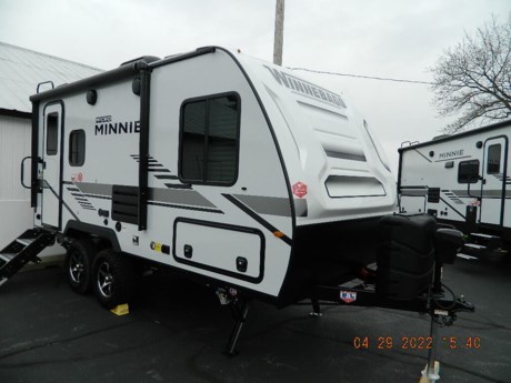 &lt;p&gt;&lt;span style=&quot;font-size: 14.0pt; font-family: Verdana; color: black; background: white;&quot;&gt;Take your next camping trip with all the comforts of home in the &lt;/span&gt;&lt;strong&gt;&lt;span style=&quot;font-size: 14.0pt; font-family: Verdana; color: red; background: white;&quot;&gt;Winnebago Micro Minnie 1808FBS&lt;/span&gt;&lt;/strong&gt;&lt;span style=&quot;font-size: 14.0pt; font-family: Verdana; color: black; background: white;&quot;&gt;.&amp;nbsp;&amp;nbsp;This is a lightweight travel trailer capable of&amp;nbsp;&lt;/span&gt;&lt;strong&gt;&lt;span style=&quot;font-size: 14.0pt; font-family: Verdana; color: red; background: white;&quot;&gt;sleeping up to 4&lt;/span&gt;&lt;/strong&gt;&lt;span style=&quot;font-size: 14.0pt; font-family: Verdana; color: black; background: white;&quot;&gt; people, but still able to be pulled by a smaller tow vehicle.&amp;nbsp;&amp;nbsp;Storage is not an issue in the 1808FBS with its front &lt;/span&gt;&lt;strong&gt;&lt;span style=&quot;font-size: 14.0pt; font-family: Verdana; color: red; background: white;&quot;&gt;pass-through storage&lt;/span&gt;&lt;/strong&gt;&lt;span style=&quot;font-size: 14.0pt; font-family: Verdana; color: black; background: white;&quot;&gt;&amp;nbsp;bay and ample amounts of interior cabinet space.&amp;nbsp;&amp;nbsp;Setting up camp is easier than ever with the standard power awning,&amp;nbsp;&lt;/span&gt;&lt;strong&gt;&lt;span style=&quot;font-size: 14.0pt; font-family: Verdana; color: red; background: white;&quot;&gt;power stabilizer jacks&lt;/span&gt;&lt;/strong&gt;&lt;span style=&quot;font-size: 14.0pt; font-family: Verdana; color: black; background: white;&quot;&gt;, power front tongue jack, and detachable 30-Amp shore power cord.&lt;span style=&quot;mso-spacerun: yes;&quot;&gt;&amp;nbsp; &lt;/span&gt;Tow this trailer with confidence with the &lt;span class=&quot;&quot;&gt;&lt;span style=&quot;border: none windowtext 1.0pt; mso-border-alt: none windowtext 0in; padding: 0in;&quot;&gt;NXG&lt;/span&gt;&lt;/span&gt;&amp;nbsp; engineered frame, dual &lt;/span&gt;&lt;strong&gt;&lt;span style=&quot;font-size: 14.0pt; font-family: Verdana; color: red; background: white;&quot;&gt;Dexter heavy duty torsion axles with easy lube wheel bearings&lt;/span&gt;&lt;/strong&gt;&lt;span style=&quot;font-size: 14.0pt; font-family: Verdana; color: black; background: white;&quot;&gt;, 15&amp;rdquo; Goodyear Wrangler tires,&amp;nbsp;&lt;/span&gt;&lt;strong&gt;&lt;span style=&quot;font-size: 14.0pt; font-family: Verdana; color: red; background: white;&quot;&gt;Aluminum wheels&lt;/span&gt;&lt;/strong&gt;&lt;span style=&quot;font-size: 14.0pt; font-family: Verdana; color: black; background: white;&quot;&gt;&amp;nbsp;and the prepped Tire Pressure Monitoring System.&amp;nbsp;&amp;nbsp;Camp year round with the&amp;nbsp;&lt;/span&gt;&lt;strong&gt;&lt;span style=&quot;font-size: 14.0pt; font-family: Verdana; color: red; background: white;&quot;&gt;Comfort Tech Package&lt;/span&gt;&lt;/strong&gt;&lt;span style=&quot;font-size: 14.0pt; font-family: Verdana; color: black; background: white;&quot;&gt;&amp;nbsp;which includes an&amp;nbsp;&lt;/span&gt;&lt;strong&gt;&lt;span style=&quot;font-size: 14.0pt; font-family: Verdana; color: red; background: white;&quot;&gt;enclosed and heated underbelly&lt;/span&gt;&lt;/strong&gt;&lt;span style=&quot;font-size: 14.0pt; font-family: Verdana; color: black; background: white;&quot;&gt;, extreme weather radiant foil insulation, thick insulated block foam, and FilonMax fiberglass sidewalls with&amp;nbsp;&lt;/span&gt;&lt;strong&gt;&lt;span style=&quot;font-size: 14.0pt; font-family: Verdana; color: red; background: white;&quot;&gt;Azdel&lt;/span&gt;&lt;/strong&gt;&lt;span style=&quot;font-size: 14.0pt; font-family: Verdana; color: black; background: white;&quot;&gt; composite backing.&amp;nbsp;&amp;nbsp;The Micro Minnie 1808FBS is a compact camper made without compromise, so if you are looking for a travel trailer that checks all the boxes, you&amp;rsquo;ve found it.&lt;/span&gt;&lt;span style=&quot;font-size: 8.5pt; font-family: Verdana; color: black; background: white;&quot;&gt;&amp;nbsp;&amp;nbsp;&lt;/span&gt;&lt;span style=&quot;font-size: 14.0pt; font-family: Verdana; color: black; background: white;&quot;&gt;Stop in during our regular business hours to see this incredible travel trailer and be sure to call ahead for availability.&lt;/span&gt;&lt;span style=&quot;font-size: 8.5pt; font-family: Verdana; color: black; background: white;&quot;&gt;&amp;nbsp;&amp;nbsp;&lt;/span&gt;&lt;span style=&quot;font-size: 14.0pt; font-family: Verdana; color: black; background: white;&quot;&gt;Get yours now before they are gone!&lt;/span&gt;&lt;/p&gt;