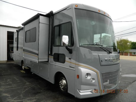 &lt;p&gt;&lt;span style=&quot;font-size: 18px;&quot;&gt;Make new memories with family and friends in the &lt;strong&gt;&lt;span style=&quot;color: #ff0000;&quot;&gt;Winnebago Adventurer 30T&lt;/span&gt;&lt;/strong&gt;.&amp;nbsp; The Adventurer is Winnebago&#39;s finest Class A gas coach built on the tried and true &lt;strong&gt;&lt;span style=&quot;color: #ff0000;&quot;&gt;Ford F-53&lt;/span&gt;&lt;/strong&gt; chassis.&amp;nbsp; Power is not an issue with Ford&#39;s new &lt;strong&gt;&lt;span style=&quot;color: #ff0000;&quot;&gt;350HP V8&lt;/span&gt;&lt;/strong&gt; gas engine with a 6-Speed automatic transmission and tow/haul mode.&amp;nbsp; Ride in comfort with the &lt;strong&gt;&lt;span style=&quot;color: #ff0000;&quot;&gt;6-way power seats&lt;/span&gt;&lt;/strong&gt; and navigate confidently with the 10&quot; infotainment screen and available &lt;strong&gt;&lt;span style=&quot;color: #ff0000;&quot;&gt;Apple CarPlay&lt;/span&gt;&lt;/strong&gt; and &lt;strong&gt;&lt;span style=&quot;color: #ff0000;&quot;&gt;Android Auto&lt;/span&gt;&lt;/strong&gt;.&amp;nbsp; Checking your blind spot is as easy as hitting your turn signal and letting the &lt;strong&gt;&lt;span style=&quot;color: #ff0000;&quot;&gt;side-mounted color cameras&lt;/span&gt;&lt;/strong&gt; do the rest.&amp;nbsp;&amp;nbsp;&lt;/span&gt;&lt;/p&gt;
&lt;p&gt;&lt;span style=&quot;font-size: 18px;&quot;&gt;Set up camp with the push of a button using the &lt;strong&gt;&lt;span style=&quot;color: #ff0000;&quot;&gt;automatic hydraulic leveling jacks&lt;/span&gt;&lt;/strong&gt;, &lt;span style=&quot;color: #000000;&quot;&gt;power room slides&lt;/span&gt;&amp;nbsp;and &lt;strong&gt;&lt;span style=&quot;color: #ff0000;&quot;&gt;power awning&lt;/span&gt;&lt;/strong&gt;.&amp;nbsp; Make a meal for the family with the 3-burner stove top and &lt;strong&gt;&lt;span style=&quot;color: #ff0000;&quot;&gt;convection oven microwave&lt;/span&gt;&lt;/strong&gt;.&amp;nbsp; Store your leftovers in the large &lt;strong&gt;&lt;span style=&quot;color: #ff0000;&quot;&gt;10 cubic foot refrigerator/freezer&lt;/span&gt;&lt;/strong&gt; and put your non-perishables in the spacious &lt;strong&gt;&lt;span style=&quot;color: #ff0000;&quot;&gt;pantry&lt;/span&gt;&lt;/strong&gt;.&amp;nbsp; When it comes to cooling, the two &lt;strong&gt;&lt;span style=&quot;color: #ff0000;&quot;&gt;13,500 BTU A/C&lt;/span&gt;&lt;/strong&gt; units will cool down the interior in a matter of minutes.&amp;nbsp; Sleep in comfort on the rear Queen bed, TrueComfort+ sofa, and the loft bed for a total of 5 sleeping spaces.&amp;nbsp; The Adventurer 30T boasts &lt;strong&gt;&lt;span style=&quot;color: #ff0000;&quot;&gt;118 cubic feet&lt;/span&gt;&lt;/strong&gt;&amp;nbsp;of exterior storage with &lt;strong&gt;&lt;span style=&quot;color: #ff0000;&quot;&gt;pass through compartments&lt;/span&gt;&lt;/strong&gt;, allowing you to bring all of your camping gear with you.&amp;nbsp; Travel in comfort and make new memories in the Winnebago Adventurer 30T.&amp;nbsp; Stop in today to see it and take it for a test drive.&amp;nbsp; Call ahead for availability.&amp;nbsp; On sale now!&lt;/span&gt;&lt;/p&gt;
&lt;h3&gt;Features&lt;/h3&gt;
&lt;h4&gt;&lt;span style=&quot;color: #ff0000;&quot;&gt;Chassis&lt;/span&gt;&lt;/h4&gt;
&lt;ul style=&quot;box-sizing: border-box; margin-top: 0px; margin-bottom: 10px; font-family: Muli, sans-serif; font-size: 16px;&quot;&gt;
&lt;li style=&quot;box-sizing: border-box;&quot;&gt;&lt;span style=&quot;font-family: verdana, geneva, sans-serif;&quot;&gt;Ford&amp;reg; F53 Chassis&lt;/span&gt;&lt;/li&gt;
&lt;li style=&quot;box-sizing: border-box;&quot;&gt;&lt;span style=&quot;font-family: verdana, geneva, sans-serif;&quot;&gt;7.3L V8 engine, TorqShift&amp;trade; 6-speed automatic transmission w/tow/haul, Hydro-Boost System power brakes, 4-wheel ABS, 210-amp. alternator&lt;/span&gt;&lt;/li&gt;
&lt;li style=&quot;box-sizing: border-box;&quot;&gt;&lt;span style=&quot;font-family: verdana, geneva, sans-serif;&quot;&gt;7-pin trailer wiring connector&lt;/span&gt;&lt;/li&gt;
&lt;li style=&quot;box-sizing: border-box;&quot;&gt;&lt;span style=&quot;font-family: verdana, geneva, sans-serif;&quot;&gt;Electronic stability control&lt;/span&gt;&lt;/li&gt;
&lt;li style=&quot;box-sizing: border-box;&quot;&gt;&lt;span style=&quot;font-family: verdana, geneva, sans-serif;&quot;&gt;Trailer Hitch 5,000-lb. draw bar/500-lb. maximum vertical tongue weight&lt;/span&gt;&lt;/li&gt;
&lt;li style=&quot;box-sizing: border-box;&quot;&gt;&lt;span style=&quot;font-family: verdana, geneva, sans-serif;&quot;&gt;Automatic hydraulic leveling jacks w/3-position controls&lt;/span&gt;&lt;/li&gt;
&lt;li style=&quot;box-sizing: border-box;&quot;&gt;&lt;span style=&quot;font-family: verdana, geneva, sans-serif;&quot;&gt;Stainless steel wheel liners&lt;/span&gt;&lt;/li&gt;
&lt;li style=&quot;box-sizing: border-box;&quot;&gt;&lt;span style=&quot;font-family: verdana, geneva, sans-serif;&quot;&gt;Rear valve stem extensions&lt;/span&gt;&lt;/li&gt;
&lt;/ul&gt;
&lt;p&gt;&amp;nbsp;&lt;/p&gt;
&lt;h4&gt;&lt;span style=&quot;color: #ff0000;&quot;&gt;Cab Conveniences&lt;/span&gt;&lt;/h4&gt;
&lt;ul style=&quot;box-sizing: border-box; margin-top: 0px; margin-bottom: 10px; font-family: Muli, sans-serif; font-size: 16px;&quot;&gt;
&lt;li style=&quot;box-sizing: border-box;&quot;&gt;&lt;span style=&quot;font-family: verdana, geneva, sans-serif;&quot;&gt;Versa driver&#39;s seat swivels easily around steering wheel, w/two-position armrest, fixed lumbar support, and multi-adjustable slide/recline&lt;/span&gt;&lt;/li&gt;
&lt;li style=&quot;box-sizing: border-box;&quot;&gt;&lt;span style=&quot;font-family: verdana, geneva, sans-serif;&quot;&gt;Passenger seat swivels, w/two-position armrest, fixed lumbar support, and multi-adjustable slide/recline&lt;/span&gt;&lt;/li&gt;
&lt;li style=&quot;box-sizing: border-box;&quot;&gt;&lt;span style=&quot;font-family: verdana, geneva, sans-serif;&quot;&gt;3-point seat belts&lt;/span&gt;&lt;/li&gt;
&lt;li style=&quot;box-sizing: border-box;&quot;&gt;&lt;span style=&quot;font-family: verdana, geneva, sans-serif;&quot;&gt;7&quot; Bluetooth&amp;reg; multimedia radio/rear view/side view&amp;nbsp;monitor system w/color touch screen, iPod&amp;reg;/MP3 input, SiriusXM&amp;reg;-ready, AUX, USB, Apple CarPlay&amp;reg; , Android Auto&amp;trade;&lt;/span&gt;&lt;/li&gt;
&lt;li style=&quot;box-sizing: border-box;&quot;&gt;&lt;span style=&quot;font-family: verdana, geneva, sans-serif;&quot;&gt;Chassis/house battery radio power switch&lt;/span&gt;&lt;/li&gt;
&lt;li style=&quot;box-sizing: border-box;&quot;&gt;&lt;span style=&quot;font-family: verdana, geneva, sans-serif;&quot;&gt;Power steering w/tilt wheel&lt;/span&gt;&lt;/li&gt;
&lt;li style=&quot;box-sizing: border-box;&quot;&gt;&lt;span style=&quot;font-family: verdana, geneva, sans-serif;&quot;&gt;Cruise control&lt;/span&gt;&lt;/li&gt;
&lt;li style=&quot;box-sizing: border-box;&quot;&gt;&lt;span style=&quot;font-family: verdana, geneva, sans-serif;&quot;&gt;Power mirrors w/defrost&lt;/span&gt;&lt;/li&gt;
&lt;li style=&quot;box-sizing: border-box;&quot;&gt;&lt;span style=&quot;font-family: verdana, geneva, sans-serif;&quot;&gt;Map lights&lt;/span&gt;&lt;/li&gt;
&lt;li style=&quot;box-sizing: border-box;&quot;&gt;&lt;span style=&quot;font-family: verdana, geneva, sans-serif;&quot;&gt;Powered MCD blackout roller visor/shade (front windshield)&lt;/span&gt;&lt;/li&gt;
&lt;li style=&quot;box-sizing: border-box;&quot;&gt;&lt;span style=&quot;font-family: verdana, geneva, sans-serif;&quot;&gt;MCD blackout roller shade (driver and passenger windows)&lt;/span&gt;&lt;/li&gt;
&lt;li style=&quot;box-sizing: border-box;&quot;&gt;&lt;span style=&quot;font-family: verdana, geneva, sans-serif;&quot;&gt;Dash workstation w/USB and 12-volt power&lt;/span&gt;&lt;/li&gt;
&lt;li style=&quot;box-sizing: border-box;&quot;&gt;&lt;span style=&quot;font-family: verdana, geneva, sans-serif;&quot;&gt;Convenience tray&lt;/span&gt;&lt;/li&gt;
&lt;li style=&quot;box-sizing: border-box;&quot;&gt;&lt;span style=&quot;font-family: verdana, geneva, sans-serif;&quot;&gt;Instrument panel&lt;/span&gt;&lt;/li&gt;
&lt;li style=&quot;box-sizing: border-box;&quot;&gt;&lt;span style=&quot;font-family: verdana, geneva, sans-serif;&quot;&gt;Removable pedestal table&lt;/span&gt;&lt;/li&gt;
&lt;/ul&gt;
&lt;h4&gt;&lt;span style=&quot;color: #ff0000;&quot;&gt;Optional Equipment&lt;/span&gt;&lt;/h4&gt;
&lt;ul style=&quot;box-sizing: border-box; margin-top: 0px; margin-bottom: 10px; font-family: Muli, sans-serif; font-size: 16px;&quot;&gt;
&lt;li style=&quot;box-sizing: border-box;&quot;&gt;&lt;span style=&quot;font-family: verdana, geneva, sans-serif;&quot;&gt;Seat Pedestal - Driver&#39;s Six-Way Power Assist&amp;nbsp;&lt;/span&gt;&lt;/li&gt;
&lt;li style=&quot;box-sizing: border-box;&quot;&gt;&lt;span style=&quot;font-family: verdana, geneva, sans-serif;&quot;&gt;Seat Pedestal - Passenger&#39;s Six-Way PowerAssist w/Powered Footrest&lt;/span&gt;&lt;/li&gt;
&lt;li style=&quot;box-sizing: border-box;&quot;&gt;&lt;span style=&quot;font-family: verdana, geneva, sans-serif;&quot;&gt;Video camera system side-mounted color cameras&lt;/span&gt;&lt;/li&gt;
&lt;li style=&quot;box-sizing: border-box;&quot;&gt;&lt;span style=&quot;font-family: verdana, geneva, sans-serif;&quot;&gt;Defroster fans&lt;/span&gt;&lt;/li&gt;
&lt;li style=&quot;box-sizing: border-box;&quot;&gt;&lt;span style=&quot;font-family: verdana, geneva, sans-serif;&quot;&gt;Satellite TV antenna w/receiver&lt;/span&gt;&lt;/li&gt;
&lt;li style=&quot;box-sizing: border-box;&quot;&gt;&lt;span style=&quot;font-family: verdana, geneva, sans-serif;&quot;&gt;Radio w/Satellite SiriusXM&amp;nbsp;&lt;/span&gt;&lt;/li&gt;
&lt;/ul&gt;
&lt;h4&gt;&lt;span style=&quot;color: #ff0000;&quot;&gt;Interior&lt;/span&gt;&lt;/h4&gt;
&lt;ul style=&quot;box-sizing: border-box; margin-top: 0px; margin-bottom: 10px; font-family: Muli, sans-serif; font-size: 16px;&quot;&gt;
&lt;li style=&quot;box-sizing: border-box;&quot;&gt;&lt;span style=&quot;font-family: verdana, geneva, sans-serif;&quot;&gt;39&quot; HDTV&lt;/span&gt;&lt;/li&gt;
&lt;li style=&quot;box-sizing: border-box;&quot;&gt;&lt;span style=&quot;font-family: verdana, geneva, sans-serif;&quot;&gt;Omni-directional TV antenna&lt;/span&gt;&lt;/li&gt;
&lt;li style=&quot;box-sizing: border-box;&quot;&gt;&lt;span style=&quot;font-family: verdana, geneva, sans-serif;&quot;&gt;LED ceiling lights&lt;/span&gt;&lt;/li&gt;
&lt;li style=&quot;box-sizing: border-box;&quot;&gt;&lt;span style=&quot;font-family: verdana, geneva, sans-serif;&quot;&gt;Satellite system ready&lt;/span&gt;&lt;/li&gt;
&lt;li style=&quot;box-sizing: border-box;&quot;&gt;&lt;span style=&quot;font-family: verdana, geneva, sans-serif;&quot;&gt;Soft vinyl ceiling&lt;/span&gt;&lt;/li&gt;
&lt;li style=&quot;box-sizing: border-box;&quot;&gt;&lt;span style=&quot;font-family: verdana, geneva, sans-serif;&quot;&gt;MCD solar/blackout shades&lt;/span&gt;&lt;/li&gt;
&lt;li style=&quot;box-sizing: border-box;&quot;&gt;&lt;span style=&quot;font-family: verdana, geneva, sans-serif;&quot;&gt;OnePlace&amp;reg; systems center&lt;/span&gt;&lt;/li&gt;
&lt;li style=&quot;box-sizing: border-box;&quot;&gt;&lt;span style=&quot;font-family: verdana, geneva, sans-serif;&quot;&gt;Tinted, dual-pane windows&lt;/span&gt;&lt;/li&gt;
&lt;li style=&quot;box-sizing: border-box;&quot;&gt;&lt;span style=&quot;font-family: verdana, geneva, sans-serif;&quot;&gt;TrueComfort+ Sofa&lt;/span&gt;&lt;/li&gt;
&lt;li style=&quot;box-sizing: border-box;&quot;&gt;&lt;span style=&quot;font-family: verdana, geneva, sans-serif;&quot;&gt;Residential vinyl flooring throughout&lt;/span&gt;&lt;/li&gt;
&lt;li style=&quot;box-sizing: border-box;&quot;&gt;&lt;span style=&quot;font-family: verdana, geneva, sans-serif;&quot;&gt;USB ports in dining area&lt;/span&gt;&lt;/li&gt;
&lt;li style=&quot;box-sizing: border-box;&quot;&gt;&lt;span style=&quot;font-family: verdana, geneva, sans-serif;&quot;&gt;Dining table &amp;amp; chairs&lt;/span&gt;&lt;/li&gt;
&lt;/ul&gt;
&lt;h4&gt;&lt;span style=&quot;color: #ff0000;&quot;&gt;Optional Equipment&lt;/span&gt;&lt;/h4&gt;
&lt;ul style=&quot;box-sizing: border-box; margin-top: 0px; margin-bottom: 10px; font-family: Muli, sans-serif; font-size: 16px;&quot;&gt;
&lt;li style=&quot;box-sizing: border-box;&quot;&gt;&lt;span style=&quot;font-family: verdana, geneva, sans-serif;&quot;&gt;StudioLoft&amp;trade; (powered w/ladder and LED lighting)&lt;/span&gt;&lt;/li&gt;
&lt;/ul&gt;
&lt;h4&gt;&lt;span style=&quot;color: #ff0000;&quot;&gt;Galley&lt;/span&gt;&lt;/h4&gt;
&lt;ul style=&quot;box-sizing: border-box; margin-top: 0px; margin-bottom: 10px; font-family: Muli, sans-serif; font-size: 16px;&quot;&gt;
&lt;li style=&quot;box-sizing: border-box;&quot;&gt;&lt;span style=&quot;font-family: verdana, geneva, sans-serif;&quot;&gt;Double stainless steel sink w/ bamboo sink covers&lt;/span&gt;&lt;/li&gt;
&lt;li style=&quot;box-sizing: border-box;&quot;&gt;&lt;span style=&quot;font-family: verdana, geneva, sans-serif;&quot;&gt;Microwave/convection oven touch control&lt;/span&gt;&lt;/li&gt;
&lt;li style=&quot;box-sizing: border-box;&quot;&gt;&lt;span style=&quot;font-family: verdana, geneva, sans-serif;&quot;&gt;Recessed 3-burner range top w/storage drawer&lt;/span&gt;&lt;/li&gt;
&lt;li style=&quot;box-sizing: border-box;&quot;&gt;&lt;span style=&quot;font-family: verdana, geneva, sans-serif;&quot;&gt;Solid surface countertop&lt;/span&gt;&lt;/li&gt;
&lt;li style=&quot;box-sizing: border-box;&quot;&gt;&lt;span style=&quot;font-family: verdana, geneva, sans-serif;&quot;&gt;Flip-up countertop extension&lt;/span&gt;&lt;/li&gt;
&lt;li style=&quot;box-sizing: border-box;&quot;&gt;&lt;span style=&quot;font-family: verdana, geneva, sans-serif;&quot;&gt;Double door 10 cu. ft. stainless steel refrigerator/freezer&lt;/span&gt;&lt;/li&gt;
&lt;li style=&quot;box-sizing: border-box;&quot;&gt;&lt;span style=&quot;font-family: verdana, geneva, sans-serif;&quot;&gt;Pantry baskets&lt;/span&gt;&lt;/li&gt;
&lt;li style=&quot;box-sizing: border-box;&quot;&gt;&lt;span style=&quot;font-family: verdana, geneva, sans-serif;&quot;&gt;Cold water purification system&lt;/span&gt;&lt;/li&gt;
&lt;/ul&gt;
&lt;h4&gt;&lt;span style=&quot;color: #ff0000;&quot;&gt;Bath&lt;/span&gt;&lt;/h4&gt;
&lt;ul style=&quot;box-sizing: border-box; margin-top: 0px; margin-bottom: 10px; font-family: Muli, sans-serif; font-size: 16px;&quot;&gt;
&lt;li style=&quot;box-sizing: border-box;&quot;&gt;&lt;span style=&quot;font-family: verdana, geneva, sans-serif;&quot;&gt;Flexible showerhead&lt;/span&gt;&lt;/li&gt;
&lt;li style=&quot;box-sizing: border-box;&quot;&gt;&lt;span style=&quot;font-family: verdana, geneva, sans-serif;&quot;&gt;Textured glass shower door&lt;/span&gt;&lt;/li&gt;
&lt;li style=&quot;box-sizing: border-box;&quot;&gt;&lt;span style=&quot;font-family: verdana, geneva, sans-serif;&quot;&gt;Skylight&lt;/span&gt;&lt;/li&gt;
&lt;li style=&quot;box-sizing: border-box;&quot;&gt;&lt;span style=&quot;font-family: verdana, geneva, sans-serif;&quot;&gt;Porcelain toilet w/foot pedal and sprayer&lt;/span&gt;&lt;/li&gt;
&lt;li style=&quot;box-sizing: border-box;&quot;&gt;&lt;span style=&quot;font-family: verdana, geneva, sans-serif;&quot;&gt;Water pump switch(es)&lt;/span&gt;&lt;/li&gt;
&lt;li style=&quot;box-sizing: border-box;&quot;&gt;&lt;span style=&quot;font-family: verdana, geneva, sans-serif;&quot;&gt;Medicine cabinet&lt;/span&gt;&lt;/li&gt;
&lt;li style=&quot;box-sizing: border-box;&quot;&gt;&lt;span style=&quot;font-family: verdana, geneva, sans-serif;&quot;&gt;Robe hook(s)&lt;/span&gt;&lt;/li&gt;
&lt;li style=&quot;box-sizing: border-box;&quot;&gt;&lt;span style=&quot;font-family: verdana, geneva, sans-serif;&quot;&gt;Tissue holder&lt;/span&gt;&lt;/li&gt;
&lt;li style=&quot;box-sizing: border-box;&quot;&gt;&lt;span style=&quot;font-family: verdana, geneva, sans-serif;&quot;&gt;Powered ventilator fan&lt;/span&gt;&lt;/li&gt;
&lt;li style=&quot;box-sizing: border-box;&quot;&gt;&lt;span style=&quot;font-family: verdana, geneva, sans-serif;&quot;&gt;Towel bar(s)&lt;/span&gt;&lt;/li&gt;
&lt;/ul&gt;
&lt;h4&gt;&lt;span style=&quot;color: #ff0000;&quot;&gt;Bedroom&lt;/span&gt;&lt;/h4&gt;
&lt;ul style=&quot;box-sizing: border-box; margin-top: 0px; margin-bottom: 10px; font-family: Muli, sans-serif; font-size: 16px;&quot;&gt;
&lt;li style=&quot;box-sizing: border-box;&quot;&gt;&lt;span style=&quot;font-family: verdana, geneva, sans-serif;&quot;&gt;Queen bed w/foam mattress and storage below&lt;/span&gt;&lt;/li&gt;
&lt;li style=&quot;box-sizing: border-box;&quot;&gt;&lt;span style=&quot;font-family: verdana, geneva, sans-serif;&quot;&gt;Headboard&lt;/span&gt;&lt;/li&gt;
&lt;li style=&quot;box-sizing: border-box;&quot;&gt;&lt;span style=&quot;font-family: verdana, geneva, sans-serif;&quot;&gt;Wardrobe&lt;/span&gt;&lt;/li&gt;
&lt;li style=&quot;box-sizing: border-box;&quot;&gt;&lt;span style=&quot;font-family: verdana, geneva, sans-serif;&quot;&gt;Storage cabinet&lt;/span&gt;&lt;/li&gt;
&lt;li style=&quot;box-sizing: border-box;&quot;&gt;&lt;span style=&quot;font-family: verdana, geneva, sans-serif;&quot;&gt;24&quot; HDTV&lt;/span&gt;&lt;/li&gt;
&lt;li style=&quot;box-sizing: border-box;&quot;&gt;&lt;span style=&quot;font-family: verdana, geneva, sans-serif;&quot;&gt;Pet Palace for pet access or storage&lt;/span&gt;&lt;/li&gt;
&lt;/ul&gt;
&lt;h4&gt;&lt;span style=&quot;color: #ff0000;&quot;&gt;Exterior&lt;/span&gt;&lt;/h4&gt;
&lt;ul style=&quot;box-sizing: border-box; margin-top: 0px; margin-bottom: 10px; font-family: Muli, sans-serif; font-size: 16px;&quot;&gt;
&lt;li style=&quot;box-sizing: border-box;&quot;&gt;&lt;span style=&quot;font-family: verdana, geneva, sans-serif;&quot;&gt;Automatic entrance door steps&lt;/span&gt;&lt;/li&gt;
&lt;li style=&quot;box-sizing: border-box;&quot;&gt;&lt;span style=&quot;font-family: verdana, geneva, sans-serif;&quot;&gt;Porch light&lt;/span&gt;&lt;/li&gt;
&lt;li style=&quot;box-sizing: border-box;&quot;&gt;&lt;span style=&quot;font-family: verdana, geneva, sans-serif;&quot;&gt;Lighted storage compartments&lt;/span&gt;&lt;/li&gt;
&lt;li style=&quot;box-sizing: border-box;&quot;&gt;&lt;span style=&quot;font-family: verdana, geneva, sans-serif;&quot;&gt;Premium high-gloss fiberglass skin&lt;/span&gt;&lt;/li&gt;
&lt;li style=&quot;box-sizing: border-box;&quot;&gt;&lt;span style=&quot;font-family: verdana, geneva, sans-serif;&quot;&gt;KeyOne&amp;trade; lock system&lt;/span&gt;&lt;/li&gt;
&lt;li style=&quot;box-sizing: border-box;&quot;&gt;&lt;span style=&quot;font-family: verdana, geneva, sans-serif;&quot;&gt;Front mud flaps&lt;/span&gt;&lt;/li&gt;
&lt;li style=&quot;box-sizing: border-box;&quot;&gt;&lt;span style=&quot;font-family: verdana, geneva, sans-serif;&quot;&gt;Ladder&lt;/span&gt;&lt;/li&gt;
&lt;li style=&quot;box-sizing: border-box;&quot;&gt;&lt;span style=&quot;font-family: verdana, geneva, sans-serif;&quot;&gt;Powered patio awning w/LED lighting&lt;/span&gt;&lt;/li&gt;
&lt;li style=&quot;box-sizing: border-box;&quot;&gt;&lt;span style=&quot;font-family: verdana, geneva, sans-serif;&quot;&gt;Rearview Mirrors w/defrost &amp;amp; power adjust&lt;/span&gt;&lt;/li&gt;
&lt;li style=&quot;box-sizing: border-box;&quot;&gt;&lt;span style=&quot;font-family: verdana, geneva, sans-serif;&quot;&gt;Protective front mask&lt;/span&gt;&lt;/li&gt;
&lt;li style=&quot;box-sizing: border-box;&quot;&gt;&lt;span style=&quot;font-family: verdana, geneva, sans-serif;&quot;&gt;PetPal leash tie down&lt;/span&gt;&lt;/li&gt;
&lt;li style=&quot;box-sizing: border-box;&quot;&gt;&lt;span style=&quot;font-family: verdana, geneva, sans-serif;&quot;&gt;Assist handle&lt;/span&gt;&lt;/li&gt;
&lt;li style=&quot;box-sizing: border-box;&quot;&gt;&lt;span style=&quot;font-family: verdana, geneva, sans-serif;&quot;&gt;Entertainment Center AC/DC receptacle, AM/FM radio, 2 speakers, removable TV table, portable satellite dish hookup&lt;/span&gt;&lt;/li&gt;
&lt;/ul&gt;
&lt;h4&gt;&lt;span style=&quot;color: #ff0000;&quot;&gt;Heating &amp;amp; Cooling System&lt;/span&gt;&lt;/h4&gt;
&lt;ul style=&quot;box-sizing: border-box; margin-top: 0px; margin-bottom: 10px; font-family: Muli, sans-serif; font-size: 16px;&quot;&gt;
&lt;li style=&quot;box-sizing: border-box;&quot;&gt;&lt;span style=&quot;font-family: verdana, geneva, sans-serif;&quot;&gt;Front A/C 15,000 BTUs w/heat pump, rear A/C 13,500 BTUs&lt;/span&gt;&lt;/li&gt;
&lt;li style=&quot;box-sizing: border-box;&quot;&gt;&lt;span style=&quot;font-family: verdana, geneva, sans-serif;&quot;&gt;35,000 BTU ducted furnace in-floor&lt;/span&gt;&lt;/li&gt;
&lt;/ul&gt;
&lt;h4&gt;&lt;span style=&quot;color: #ff0000;&quot;&gt;Electrical System&lt;/span&gt;&lt;/h4&gt;
&lt;ul style=&quot;box-sizing: border-box; margin-top: 0px; margin-bottom: 10px; font-family: Muli, sans-serif; font-size: 16px;&quot;&gt;
&lt;li style=&quot;box-sizing: border-box;&quot;&gt;&lt;span style=&quot;font-family: verdana, geneva, sans-serif;&quot;&gt;AC/DC electrical distribution system&lt;/span&gt;&lt;/li&gt;
&lt;li style=&quot;box-sizing: border-box;&quot;&gt;&lt;span style=&quot;font-family: verdana, geneva, sans-serif;&quot;&gt;45-amp. converter/charger&lt;/span&gt;&lt;/li&gt;
&lt;li style=&quot;box-sizing: border-box;&quot;&gt;&lt;span style=&quot;font-family: verdana, geneva, sans-serif;&quot;&gt;50-amp. power cord&lt;/span&gt;&lt;/li&gt;
&lt;li style=&quot;box-sizing: border-box;&quot;&gt;&lt;span style=&quot;font-family: verdana, geneva, sans-serif;&quot;&gt;5,500-watt Cummins Onan&amp;reg;&amp;nbsp;gas generator&lt;/span&gt;&lt;/li&gt;
&lt;li style=&quot;box-sizing: border-box;&quot;&gt;&lt;span style=&quot;font-family: verdana, geneva, sans-serif;&quot;&gt;Automatic generator start system&lt;/span&gt;&lt;/li&gt;
&lt;li style=&quot;box-sizing: border-box;&quot;&gt;&lt;span style=&quot;font-family: verdana, geneva, sans-serif;&quot;&gt;Generator/shoreline automatic changeover switch&lt;/span&gt;&lt;/li&gt;
&lt;li style=&quot;box-sizing: border-box;&quot;&gt;&lt;span style=&quot;font-family: verdana, geneva, sans-serif;&quot;&gt;2 deep-cycle, Group 31 Marine/RV batteries&lt;/span&gt;&lt;/li&gt;
&lt;li style=&quot;box-sizing: border-box;&quot;&gt;&lt;span style=&quot;font-family: verdana, geneva, sans-serif;&quot;&gt;Battery disconnect systems (coach and chassis)&lt;/span&gt;&lt;/li&gt;
&lt;li style=&quot;box-sizing: border-box;&quot;&gt;&lt;span style=&quot;font-family: verdana, geneva, sans-serif;&quot;&gt;PowerLine&amp;reg; Energy Management System&lt;/span&gt;&lt;/li&gt;
&lt;li style=&quot;box-sizing: border-box;&quot;&gt;&lt;span style=&quot;font-family: verdana, geneva, sans-serif;&quot;&gt;Automatic dual-battery charge control&lt;/span&gt;&lt;/li&gt;
&lt;li style=&quot;box-sizing: border-box;&quot;&gt;&lt;span style=&quot;font-family: verdana, geneva, sans-serif;&quot;&gt;Auxiliary start circuit&lt;/span&gt;&lt;/li&gt;
&lt;li style=&quot;box-sizing: border-box;&quot;&gt;&lt;span style=&quot;font-family: verdana, geneva, sans-serif;&quot;&gt;Exterior antenna jack and AC duplex receptacle&lt;/span&gt;&lt;/li&gt;
&lt;li style=&quot;box-sizing: border-box;&quot;&gt;&lt;span style=&quot;font-family: verdana, geneva, sans-serif;&quot;&gt;1,000-watt inverter&lt;/span&gt;&lt;/li&gt;
&lt;li style=&quot;box-sizing: border-box;&quot;&gt;&lt;span style=&quot;font-family: verdana, geneva, sans-serif;&quot;&gt;Cable TV input&lt;/span&gt;&lt;/li&gt;
&lt;li style=&quot;box-sizing: border-box;&quot;&gt;&lt;span style=&quot;font-family: verdana, geneva, sans-serif;&quot;&gt;Portable satellite dish hookup&lt;/span&gt;&lt;/li&gt;
&lt;li style=&quot;box-sizing: border-box;&quot;&gt;&lt;span style=&quot;font-family: verdana, geneva, sans-serif;&quot;&gt;Wi-Fi Prep Kit&lt;/span&gt;&lt;/li&gt;
&lt;li style=&quot;box-sizing: border-box;&quot;&gt;&lt;span style=&quot;font-family: verdana, geneva, sans-serif;&quot;&gt;Solar panel/battery charger prep kit&lt;/span&gt;&lt;/li&gt;
&lt;/ul&gt;
&lt;h4&gt;&lt;span style=&quot;color: #ff0000;&quot;&gt;Optional Equipment&lt;/span&gt;&lt;/h4&gt;
&lt;ul style=&quot;box-sizing: border-box; margin-top: 0px; margin-bottom: 10px; font-family: Muli, sans-serif; font-size: 16px;&quot; role=&quot;presentation&quot;&gt;
&lt;li style=&quot;box-sizing: border-box;&quot;&gt;&lt;span style=&quot;font-family: verdana, geneva, sans-serif;&quot;&gt;Solar panel battery charger&lt;/span&gt;&lt;/li&gt;
&lt;/ul&gt;
&lt;h4&gt;&lt;span style=&quot;color: #ff0000;&quot;&gt;Plumbing System&lt;/span&gt;&lt;/h4&gt;
&lt;ul style=&quot;box-sizing: border-box; margin-top: 0px; margin-bottom: 10px; font-family: Muli, sans-serif; font-size: 16px;&quot;&gt;
&lt;li style=&quot;box-sizing: border-box;&quot;&gt;&lt;span style=&quot;font-family: verdana, geneva, sans-serif;&quot;&gt;Service center color-coded labels, pressurized city water hookup w/diverter valve, drainage valves, 10&#39; sewer hose, QuickPort&amp;reg; service connection hatch, exterior wash station w/lighted pump switch, sewage pump macerator&lt;/span&gt;&lt;/li&gt;
&lt;li style=&quot;box-sizing: border-box;&quot;&gt;&lt;span style=&quot;font-family: verdana, geneva, sans-serif;&quot;&gt;Permanent-mount LP tank w/gauge&lt;/span&gt;&lt;/li&gt;
&lt;li style=&quot;box-sizing: border-box;&quot;&gt;&lt;span style=&quot;font-family: verdana, geneva, sans-serif;&quot;&gt;On-demand water pump&lt;/span&gt;&lt;/li&gt;
&lt;li style=&quot;box-sizing: border-box;&quot;&gt;&lt;span style=&quot;font-family: verdana, geneva, sans-serif;&quot;&gt;TrueLevel&amp;trade; holding tank monitoring system&lt;/span&gt;&lt;/li&gt;
&lt;li style=&quot;box-sizing: border-box;&quot;&gt;&lt;span style=&quot;font-family: verdana, geneva, sans-serif;&quot;&gt;Winterization Package water heater bypass valve and siphon tube&lt;/span&gt;&lt;/li&gt;
&lt;li style=&quot;box-sizing: border-box;&quot;&gt;&lt;span style=&quot;font-family: verdana, geneva, sans-serif;&quot;&gt;Heated holding tank compartment&lt;/span&gt;&lt;/li&gt;
&lt;li style=&quot;box-sizing: border-box;&quot;&gt;&lt;span style=&quot;font-family: verdana, geneva, sans-serif;&quot;&gt;6-gallon 110-volt/LP water heater&lt;/span&gt;&lt;/li&gt;
&lt;li style=&quot;box-sizing: border-box;&quot;&gt;&lt;span style=&quot;font-family: verdana, geneva, sans-serif;&quot;&gt;Holding tank flushing system&amp;nbsp;&lt;/span&gt;&lt;/li&gt;
&lt;li style=&quot;box-sizing: border-box;&quot;&gt;&lt;span style=&quot;font-family: verdana, geneva, sans-serif;&quot;&gt;LPG accessory connection (patio area)&lt;/span&gt;&lt;/li&gt;
&lt;li style=&quot;box-sizing: border-box;&quot;&gt;&lt;span style=&quot;font-family: verdana, geneva, sans-serif;&quot;&gt;Water system filtration package&lt;/span&gt;&lt;/li&gt;
&lt;/ul&gt;
&lt;h4&gt;&lt;span style=&quot;color: #ff0000;&quot;&gt;Safety&lt;/span&gt;&lt;/h4&gt;
&lt;ul style=&quot;box-sizing: border-box; margin-top: 0px; margin-bottom: 10px; font-family: Muli, sans-serif; font-size: 16px;&quot;&gt;
&lt;li style=&quot;box-sizing: border-box;&quot;&gt;&lt;span style=&quot;font-family: verdana, geneva, sans-serif;&quot;&gt;LP, smoke, and carbon monoxide detectors&lt;/span&gt;&lt;/li&gt;
&lt;li style=&quot;box-sizing: border-box;&quot;&gt;&lt;span style=&quot;font-family: verdana, geneva, sans-serif;&quot;&gt;Fire extinguisher&lt;/span&gt;&lt;/li&gt;
&lt;li style=&quot;box-sizing: border-box;&quot;&gt;&lt;span style=&quot;font-family: verdana, geneva, sans-serif;&quot;&gt;Ground fault interrupter&lt;/span&gt;&lt;/li&gt;
&lt;li style=&quot;box-sizing: border-box;&quot;&gt;&lt;span style=&quot;font-family: verdana, geneva, sans-serif;&quot;&gt;High-mount brake lamp&lt;/span&gt;&lt;/li&gt;
&lt;/ul&gt;
&lt;h4&gt;&lt;span style=&quot;color: #ff0000;&quot;&gt;Warranty&lt;/span&gt;&lt;/h4&gt;
&lt;ul&gt;
&lt;li&gt;&lt;span style=&quot;font-family: verdana, geneva, sans-serif; font-size: 16px;&quot;&gt;12-month/15,000-mile basic limited warranty*&lt;/span&gt;&lt;/li&gt;
&lt;li&gt;&lt;span style=&quot;font-family: verdana, geneva, sans-serif; font-size: 16px;&quot;&gt;36-month/36,000-mile limited warranty on structure*&lt;/span&gt;&lt;/li&gt;
&lt;li&gt;&lt;span style=&quot;font-family: verdana, geneva, sans-serif; font-size: 16px;&quot;&gt;10-year limited parts-and-labor warranty on roof skin*&lt;/span&gt;&lt;/li&gt;
&lt;/ul&gt;