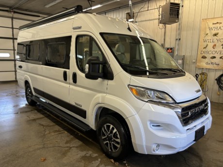 &lt;p&gt;&lt;span style=&quot;font-size: 14.0pt; font-family: Verdana; mso-bidi-font-family: Arial; color: #373a3c; background: white;&quot;&gt;There is a reason the Winnebago&amp;nbsp;Travato&amp;nbsp;is the top-selling Camper-Van in North America! Their innovative features like an optional&amp;nbsp;&lt;/span&gt;&lt;strong&gt;&lt;span style=&quot;font-size: 14.0pt; font-family: Verdana; mso-bidi-font-family: Arial; color: red; background: white;&quot;&gt;inflatable cab seat bed&lt;/span&gt;&lt;/strong&gt;&lt;span style=&quot;font-size: 14.0pt; font-family: Verdana; mso-bidi-font-family: Arial; color: #373a3c; background: white;&quot;&gt;&amp;nbsp;and convenient wet bath with an&amp;nbsp;&lt;/span&gt;&lt;strong&gt;&lt;span style=&quot;font-size: 14.0pt; font-family: Verdana; mso-bidi-font-family: Arial; color: red; background: white;&quot;&gt;Oxygenics&amp;nbsp;shower head&lt;/span&gt;&lt;/strong&gt;&lt;span style=&quot;font-size: 14.0pt; font-family: Verdana; mso-bidi-font-family: Arial; color: #373a3c; background: white;&quot;&gt;&amp;nbsp;make life on the go easier. The&amp;nbsp;&lt;/span&gt;&lt;strong&gt;&lt;span style=&quot;font-size: 14.0pt; font-family: Verdana; mso-bidi-font-family: Arial; color: red; background: white;&quot;&gt;rear annex&lt;/span&gt;&lt;/strong&gt;&lt;span style=&quot;font-size: 14.0pt; font-family: Verdana; mso-bidi-font-family: Arial; color: #373a3c; background: white;&quot;&gt;&amp;nbsp;extends your living space and gives you the versatility of hanging wet gear or using it as an outdoor shower. The&amp;nbsp;Travato&amp;nbsp;is built on the&amp;nbsp;&lt;strong&gt;&lt;span style=&quot;color: #ff0000;&quot;&gt;Ram&lt;/span&gt;&amp;nbsp;&lt;/strong&gt;&lt;/span&gt;&lt;strong&gt;&lt;span style=&quot;font-size: 14.0pt; font-family: Verdana; mso-bidi-font-family: Arial; color: red; background: white;&quot;&gt;ProMaster&amp;nbsp;3500 chassis,&amp;nbsp;&lt;/span&gt;&lt;/strong&gt;&lt;span style=&quot;font-size: 14.0pt; font-family: Verdana; mso-bidi-font-family: Arial; color: #373a3c; background: white;&quot;&gt;equipped&amp;nbsp;with a&amp;nbsp;&lt;/span&gt;&lt;strong&gt;&lt;span style=&quot;font-size: 14.0pt; font-family: Verdana; mso-bidi-font-family: Arial; color: red; background: white;&quot;&gt;3.6L V6 gas engine&lt;/span&gt;&lt;/strong&gt;&lt;span style=&quot;font-size: 14.0pt; font-family: Verdana; mso-bidi-font-family: Arial; color: #373a3c; background: white;&quot;&gt;&amp;nbsp;and a 9-speed automatic transmission.&amp;nbsp; Travel to your destination with advanced safety features like cross wind assist, post collision braking, full speed collision warning plus and more.&amp;nbsp; Camp in cold weather with the on-board&amp;nbsp;&lt;/span&gt;&lt;span class=&quot;&quot;&gt;&lt;strong&gt;&lt;span style=&quot;font-size: 14.0pt; font-family: Verdana; mso-bidi-font-family: Arial; color: red; border: none windowtext 1.0pt; mso-border-alt: none windowtext 0in; padding: 0in; background: white;&quot;&gt;Truma&lt;/span&gt;&lt;/strong&gt;&lt;/span&gt;&lt;strong&gt;&lt;span style=&quot;font-size: 14.0pt; font-family: Verdana; mso-bidi-font-family: Arial; color: red; background: white;&quot;&gt;&amp;nbsp;&lt;span class=&quot;&quot;&gt;&lt;span style=&quot;border: none windowtext 1.0pt; mso-border-alt: none windowtext 0in; padding: 0in;&quot;&gt;Combi&lt;/span&gt;&lt;/span&gt;&amp;nbsp;Eco Plus&amp;nbsp;&lt;/span&gt;&lt;/strong&gt;&lt;span style=&quot;font-size: 14.0pt; font-family: Verdana; mso-bidi-font-family: Arial; color: #373a3c; background: white;&quot;&gt;heating system that can run off propane or electricity to heat the coach and your water.&amp;nbsp; Ditch the campground and go off grid with the on-board, super quiet&amp;nbsp;&lt;span style=&quot;color: #ff0000;&quot;&gt;&lt;strong&gt;Cummins&amp;nbsp;&lt;/strong&gt;&lt;/span&gt;&lt;/span&gt;&lt;strong&gt;&lt;span style=&quot;font-size: 14.0pt; font-family: Verdana; mso-bidi-font-family: Arial; color: red; background: white;&quot;&gt;Onan&amp;nbsp;2800&lt;/span&gt;&lt;/strong&gt;&lt;span style=&quot;font-size: 14.0pt; font-family: Verdana; mso-bidi-font-family: Arial; color: #373a3c; background: white;&quot;&gt;&amp;nbsp;gas generator, ensuring you have power wherever you go.&amp;nbsp; Turn on the ultra quiet&amp;nbsp;&lt;/span&gt;&lt;strong&gt;&lt;span style=&quot;font-size: 14.0pt; font-family: Verdana; mso-bidi-font-family: Arial; color: red; background: white;&quot;&gt;Coleman Mach 10 A/C&lt;/span&gt;&lt;/strong&gt;&lt;span style=&quot;font-size: 14.0pt; font-family: Verdana; mso-bidi-font-family: Arial; color: #373a3c; background: white;&quot;&gt;&amp;nbsp;to cool off or leave your side and rear doors open with the screens down to let in a cool breeze.&amp;nbsp; Enjoy a night in watching a show on the&amp;nbsp;&lt;/span&gt;&lt;strong&gt;&lt;span style=&quot;font-size: 14.0pt; font-family: Verdana; mso-bidi-font-family: Arial; color: red; background: white;&quot;&gt;24&quot;&amp;nbsp;HDTV&lt;/span&gt;&lt;/strong&gt;&lt;span style=&quot;font-size: 14.0pt; font-family: Verdana; mso-bidi-font-family: Arial; color: #373a3c; background: white;&quot;&gt;&amp;nbsp;or spend the evening under the&amp;nbsp;&lt;/span&gt;&lt;strong&gt;&lt;span style=&quot;font-size: 14.0pt; font-family: Verdana; mso-bidi-font-family: Arial; color: red; background: white;&quot;&gt;13 foot power awning&amp;nbsp;&lt;/span&gt;&lt;/strong&gt;&lt;span style=&quot;font-size: 14.0pt; font-family: Verdana; mso-bidi-font-family: Arial; color: #373a3c; background: white;&quot;&gt;with LED lights!&amp;nbsp; The possibilities are endless in the iconic Winnebago&amp;nbsp;Travato.&amp;nbsp; Stop in to see one today and take it for a test drive.&lt;/span&gt;&lt;/p&gt;
&lt;h3 style=&quot;box-sizing: border-box; margin-top: 0px; margin-bottom: 0.5rem; line-height: 1.2; font-family: &#39;Source Sans Pro&#39;, sans-serif; text-transform: uppercase; text-align: center; padding-top: 1.5rem; color: #212529; font-size: 1.5rem !important;&quot;&gt;FEATURES&lt;/h3&gt;
&lt;h4 style=&quot;box-sizing: border-box; margin-top: 0px; margin-bottom: 0.5rem; font-weight: 500; line-height: 1.2; font-size: 1.5rem; font-family: &#39;Source Sans Pro&#39;, sans-serif; color: #212529;&quot;&gt;&lt;span style=&quot;box-sizing: border-box; color: #ff0000;&quot;&gt;Chassis&lt;/span&gt;&lt;/h4&gt;
&lt;ul style=&quot;box-sizing: border-box; padding-left: 2rem; margin-top: 0px; margin-bottom: 1rem; color: #212529; font-family: &#39;Source Sans Pro&#39;, sans-serif; font-size: 18px;&quot;&gt;
&lt;li style=&quot;box-sizing: border-box; color: #34393e; font-family: BertholdGrotesk-Regular, Arial, Helvetica, sans-serif; font-size: 20px;&quot;&gt;&lt;span style=&quot;box-sizing: border-box; font-family: verdana, geneva, sans-serif; font-size: 16px;&quot;&gt;Ram&amp;nbsp;ProMaster&lt;span style=&quot;box-sizing: border-box; line-height: 1; position: relative; vertical-align: baseline; top: -0.5em; color: #3d3d3d;&quot;&gt;&amp;reg;&lt;/span&gt;&amp;nbsp;280-hp, 3.6L V6 gas engine, 9-speed automatic 62TE transmission, 180-amp. alternator&lt;/span&gt;&lt;/li&gt;
&lt;li style=&quot;box-sizing: border-box; color: #34393e; font-family: BertholdGrotesk-Regular, Arial, Helvetica, sans-serif; font-size: 20px;&quot;&gt;&lt;span style=&quot;box-sizing: border-box; font-family: verdana, geneva, sans-serif; font-size: 16px;&quot;&gt;4-wheel ABS brakes&lt;/span&gt;&lt;/li&gt;
&lt;li style=&quot;box-sizing: border-box; color: #34393e; font-family: BertholdGrotesk-Regular, Arial, Helvetica, sans-serif; font-size: 20px;&quot;&gt;&lt;span style=&quot;box-sizing: border-box; font-family: verdana, geneva, sans-serif; font-size: 16px;&quot;&gt;Stylized aluminum wheels&lt;/span&gt;&lt;/li&gt;
&lt;li style=&quot;box-sizing: border-box; color: #34393e; font-family: BertholdGrotesk-Regular, Arial, Helvetica, sans-serif; font-size: 20px;&quot;&gt;&lt;span style=&quot;box-sizing: border-box; font-family: verdana, geneva, sans-serif; font-size: 16px;&quot;&gt;Trailer Hitch 3,500-lb.&amp;nbsp;drawbar/350-lb. maximum vertical tongue weight&lt;/span&gt;&lt;/li&gt;
&lt;/ul&gt;
&lt;h4 style=&quot;box-sizing: border-box; margin-top: 0px; margin-bottom: 0.5rem; font-weight: 500; line-height: 1.2; font-size: 1.5rem; font-family: &#39;Source Sans Pro&#39;, sans-serif; color: #212529;&quot;&gt;&lt;span style=&quot;box-sizing: border-box; color: #ff0000;&quot;&gt;Cab Conveniences&lt;/span&gt;&lt;/h4&gt;
&lt;ul style=&quot;box-sizing: border-box; padding-left: 2rem; margin-top: 0px; margin-bottom: 1rem; color: #212529; font-family: &#39;Source Sans Pro&#39;, sans-serif; font-size: 18px;&quot;&gt;
&lt;li style=&quot;box-sizing: border-box; color: #34393e; font-family: BertholdGrotesk-Regular, Arial, Helvetica, sans-serif; font-size: 20px;&quot;&gt;&lt;span style=&quot;box-sizing: border-box; font-family: verdana, geneva, sans-serif; font-size: 16px;&quot;&gt;Radio/rearview&amp;nbsp;monitor system&amp;nbsp;touchscreen, steering wheel controls, rear camera and&amp;nbsp;USB&amp;nbsp;ports&lt;/span&gt;&lt;/li&gt;
&lt;li style=&quot;box-sizing: border-box; color: #34393e; font-family: BertholdGrotesk-Regular, Arial, Helvetica, sans-serif; font-size: 20px;&quot;&gt;&lt;span style=&quot;box-sizing: border-box; font-family: verdana, geneva, sans-serif; font-size: 16px;&quot;&gt;Cab seats adjustable headrest, and slide/swivel/recline&lt;/span&gt;&lt;/li&gt;
&lt;li style=&quot;box-sizing: border-box; color: #34393e; font-family: BertholdGrotesk-Regular, Arial, Helvetica, sans-serif; font-size: 20px;&quot;&gt;&lt;span style=&quot;box-sizing: border-box; font-family: verdana, geneva, sans-serif; font-size: 16px;&quot;&gt;Airbags&amp;nbsp;driver and passenger front, side curtain, side seat bolster&lt;/span&gt;&lt;/li&gt;
&lt;li style=&quot;box-sizing: border-box; color: #34393e; font-family: BertholdGrotesk-Regular, Arial, Helvetica, sans-serif; font-size: 20px;&quot;&gt;&lt;span style=&quot;box-sizing: border-box; font-family: verdana, geneva, sans-serif; font-size: 16px;&quot;&gt;Cruise control&lt;/span&gt;&lt;/li&gt;
&lt;li style=&quot;box-sizing: border-box; color: #34393e; font-family: BertholdGrotesk-Regular, Arial, Helvetica, sans-serif; font-size: 20px;&quot;&gt;&lt;span style=&quot;box-sizing: border-box; font-family: verdana, geneva, sans-serif; font-size: 16px;&quot;&gt;3-point seat belts&lt;/span&gt;&lt;/li&gt;
&lt;li style=&quot;box-sizing: border-box; color: #34393e; font-family: BertholdGrotesk-Regular, Arial, Helvetica, sans-serif; font-size: 20px;&quot;&gt;&lt;span style=&quot;box-sizing: border-box; font-family: verdana, geneva, sans-serif; font-size: 16px;&quot;&gt;Electric power steering&lt;/span&gt;&lt;/li&gt;
&lt;li style=&quot;box-sizing: border-box; color: #34393e; font-family: BertholdGrotesk-Regular, Arial, Helvetica, sans-serif; font-size: 20px;&quot;&gt;&lt;span style=&quot;box-sizing: border-box; font-family: verdana, geneva, sans-serif; font-size: 16px;&quot;&gt;Power mirrors&amp;nbsp;w/defrost and turn signal&lt;/span&gt;&lt;/li&gt;
&lt;li style=&quot;box-sizing: border-box; color: #34393e; font-family: BertholdGrotesk-Regular, Arial, Helvetica, sans-serif; font-size: 20px;&quot;&gt;&lt;span style=&quot;box-sizing: border-box; font-family: verdana, geneva, sans-serif; font-size: 16px;&quot;&gt;Power door locks&amp;nbsp;w/remote&lt;/span&gt;&lt;/li&gt;
&lt;li style=&quot;box-sizing: border-box; color: #34393e; font-family: BertholdGrotesk-Regular, Arial, Helvetica, sans-serif; font-size: 20px;&quot;&gt;&lt;span style=&quot;box-sizing: border-box; font-family: verdana, geneva, sans-serif; font-size: 16px;&quot;&gt;Power windows&lt;/span&gt;&lt;/li&gt;
&lt;li style=&quot;box-sizing: border-box; color: #34393e; font-family: BertholdGrotesk-Regular, Arial, Helvetica, sans-serif; font-size: 20px;&quot;&gt;&lt;span style=&quot;box-sizing: border-box; font-family: verdana, geneva, sans-serif; font-size: 16px;&quot;&gt;12-volt&amp;nbsp;powerpoints&lt;/span&gt;&lt;/li&gt;
&lt;li style=&quot;box-sizing: border-box; color: #34393e; font-family: BertholdGrotesk-Regular, Arial, Helvetica, sans-serif; font-size: 20px;&quot;&gt;&lt;span style=&quot;box-sizing: border-box; font-family: verdana, geneva, sans-serif; font-size: 16px;&quot;&gt;Digital&amp;nbsp;rearview&amp;nbsp;mirror&lt;/span&gt;&lt;/li&gt;
&lt;li style=&quot;box-sizing: border-box; color: #34393e; font-family: BertholdGrotesk-Regular, Arial, Helvetica, sans-serif; font-size: 20px;&quot;&gt;&lt;span style=&quot;box-sizing: border-box; font-family: verdana, geneva, sans-serif; font-size: 16px;&quot;&gt;Crosswind assist&lt;/span&gt;&lt;/li&gt;
&lt;li style=&quot;box-sizing: border-box; color: #34393e; font-family: BertholdGrotesk-Regular, Arial, Helvetica, sans-serif; font-size: 20px;&quot;&gt;&lt;span style=&quot;box-sizing: border-box; font-family: verdana, geneva, sans-serif; font-size: 16px;&quot;&gt;Sunvisors&lt;/span&gt;&lt;/li&gt;
&lt;li style=&quot;box-sizing: border-box; color: #34393e; font-family: BertholdGrotesk-Regular, Arial, Helvetica, sans-serif; font-size: 20px;&quot;&gt;&lt;span style=&quot;box-sizing: border-box; font-family: verdana, geneva, sans-serif; font-size: 16px;&quot;&gt;Front and cab window privacy panels&lt;/span&gt;&lt;/li&gt;
&lt;li style=&quot;box-sizing: border-box; color: #34393e; font-family: BertholdGrotesk-Regular, Arial, Helvetica, sans-serif; font-size: 20px;&quot;&gt;&lt;span style=&quot;box-sizing: border-box; font-family: verdana, geneva, sans-serif; font-size: 16px;&quot;&gt;Carpet floor mat&lt;/span&gt;&lt;/li&gt;
&lt;li style=&quot;box-sizing: border-box; color: #34393e; font-family: BertholdGrotesk-Regular, Arial, Helvetica, sans-serif; font-size: 20px;&quot;&gt;&lt;span style=&quot;box-sizing: border-box; font-family: verdana, geneva, sans-serif; font-size: 16px;&quot;&gt;Appliqu&amp;eacute; package&lt;/span&gt;&lt;/li&gt;
&lt;li style=&quot;box-sizing: border-box; color: #34393e; font-family: BertholdGrotesk-Regular, Arial, Helvetica, sans-serif; font-size: 20px;&quot;&gt;&lt;span style=&quot;box-sizing: border-box; font-family: verdana, geneva, sans-serif; font-size: 16px;&quot;&gt;SuperSprings&lt;span style=&quot;box-sizing: border-box; line-height: 1; position: relative; vertical-align: baseline; top: -0.5em; color: #3d3d3d;&quot;&gt;&amp;reg;&lt;/span&gt;&amp;nbsp;SumoSprings&lt;span style=&quot;box-sizing: border-box; line-height: 1; position: relative; vertical-align: baseline; top: -0.5em; color: #3d3d3d;&quot;&gt;&amp;reg;&lt;/span&gt;&amp;nbsp;(front and rear)&lt;/span&gt;&lt;/li&gt;
&lt;li style=&quot;box-sizing: border-box; color: #34393e; font-family: BertholdGrotesk-Regular, Arial, Helvetica, sans-serif; font-size: 20px;&quot;&gt;&lt;span style=&quot;box-sizing: border-box; font-family: verdana, geneva, sans-serif; font-size: 16px;&quot;&gt;Passive entry&lt;/span&gt;&lt;/li&gt;
&lt;li style=&quot;box-sizing: border-box; color: #34393e; font-family: BertholdGrotesk-Regular, Arial, Helvetica, sans-serif; font-size: 20px;&quot;&gt;&lt;span style=&quot;box-sizing: border-box; font-family: verdana, geneva, sans-serif; font-size: 16px;&quot;&gt;Push button start&lt;/span&gt;&lt;/li&gt;
&lt;li style=&quot;box-sizing: border-box; color: #34393e; font-family: BertholdGrotesk-Regular, Arial, Helvetica, sans-serif; font-size: 20px;&quot;&gt;&lt;span style=&quot;box-sizing: border-box; font-family: verdana, geneva, sans-serif; font-size: 16px;&quot;&gt;Traffic sign assist&lt;/span&gt;&lt;/li&gt;
&lt;li style=&quot;box-sizing: border-box; color: #34393e; font-family: BertholdGrotesk-Regular, Arial, Helvetica, sans-serif; font-size: 20px;&quot;&gt;&lt;span style=&quot;box-sizing: border-box; font-family: verdana, geneva, sans-serif; font-size: 16px;&quot;&gt;Full-speed forward collision warning plus&lt;/span&gt;&lt;/li&gt;
&lt;li style=&quot;box-sizing: border-box; color: #34393e; font-family: BertholdGrotesk-Regular, Arial, Helvetica, sans-serif; font-size: 20px;&quot;&gt;&lt;span style=&quot;box-sizing: border-box; font-family: verdana, geneva, sans-serif; font-size: 16px;&quot;&gt;Pedestrian automatic emergency braking system&lt;/span&gt;&lt;/li&gt;
&lt;li style=&quot;box-sizing: border-box; color: #34393e; font-family: BertholdGrotesk-Regular, Arial, Helvetica, sans-serif; font-size: 20px;&quot;&gt;&lt;span style=&quot;box-sizing: border-box; font-family: verdana, geneva, sans-serif; font-size: 16px;&quot;&gt;Post collision braking&lt;/span&gt;&lt;/li&gt;
&lt;/ul&gt;
&lt;h4 style=&quot;box-sizing: border-box; margin-top: 0px; margin-bottom: 0.5rem; font-weight: 500; line-height: 1.2; font-size: 1.5rem; font-family: &#39;Source Sans Pro&#39;, sans-serif; color: #212529;&quot;&gt;&lt;span style=&quot;box-sizing: border-box; color: #ff0000;&quot;&gt;Optional Equipment&lt;/span&gt;&lt;/h4&gt;
&lt;p style=&quot;box-sizing: border-box; margin: 0px; padding: 0px; line-height: 1.25; color: #212529; font-family: &#39;Source Sans Pro&#39;, sans-serif; font-size: 18px;&quot;&gt;&lt;span style=&quot;box-sizing: border-box; color: #ff0000; font-family: verdana, geneva, sans-serif; font-size: 16px;&quot;&gt;&lt;span style=&quot;box-sizing: border-box; color: #34393e;&quot;&gt;Cab seats&amp;nbsp;w/Ultraleather&lt;/span&gt;&lt;span style=&quot;box-sizing: border-box; line-height: 1; position: relative; vertical-align: baseline; top: -0.5em; color: #3d3d3d;&quot;&gt;&amp;reg;&lt;/span&gt;&lt;span style=&quot;box-sizing: border-box; color: #34393e;&quot;&gt;&amp;nbsp;covering&lt;/span&gt;&lt;/span&gt;&lt;/p&gt;
&lt;h4 style=&quot;box-sizing: border-box; margin-top: 0px; margin-bottom: 0.5rem; font-weight: 500; line-height: 1.2; font-size: 1.5rem; font-family: &#39;Source Sans Pro&#39;, sans-serif; color: #212529;&quot;&gt;&lt;span style=&quot;box-sizing: border-box; color: #ff0000;&quot;&gt;Interior&lt;/span&gt;&lt;/h4&gt;
&lt;ul style=&quot;box-sizing: border-box; padding-left: 2rem; margin-top: 0px; margin-bottom: 1rem; color: #212529; font-family: &#39;Source Sans Pro&#39;, sans-serif; font-size: 18px;&quot;&gt;
&lt;li style=&quot;box-sizing: border-box; color: #34393e; font-family: BertholdGrotesk-Regular, Arial, Helvetica, sans-serif; font-size: 20px;&quot;&gt;&lt;span style=&quot;box-sizing: border-box; font-family: verdana, geneva, sans-serif; font-size: 16px;&quot;&gt;24&quot;&amp;nbsp;HDTV&amp;nbsp;and&amp;nbsp;Bluetooth&lt;span style=&quot;box-sizing: border-box; line-height: 1; position: relative; vertical-align: baseline; top: -0.5em; color: #3d3d3d;&quot;&gt;&amp;reg;&amp;nbsp;&lt;/span&gt;soundbar&lt;/span&gt;&lt;/li&gt;
&lt;li style=&quot;box-sizing: border-box; color: #34393e; font-family: BertholdGrotesk-Regular, Arial, Helvetica, sans-serif; font-size: 20px;&quot;&gt;&lt;span style=&quot;box-sizing: border-box; font-family: verdana, geneva, sans-serif; font-size: 16px;&quot;&gt;Pedestal w/pop-up outlets and mount for table&lt;/span&gt;&lt;/li&gt;
&lt;li style=&quot;box-sizing: border-box; color: #34393e; font-family: BertholdGrotesk-Regular, Arial, Helvetica, sans-serif; font-size: 20px;&quot;&gt;&lt;span style=&quot;box-sizing: border-box; font-family: verdana, geneva, sans-serif; font-size: 16px;&quot;&gt;Amplified digital TV antenna&lt;/span&gt;&lt;/li&gt;
&lt;li style=&quot;box-sizing: border-box; color: #34393e; font-family: BertholdGrotesk-Regular, Arial, Helvetica, sans-serif; font-size: 20px;&quot;&gt;&lt;span style=&quot;box-sizing: border-box; font-family: verdana, geneva, sans-serif; font-size: 16px;&quot;&gt;LED ceiling lights&lt;/span&gt;&lt;/li&gt;
&lt;li style=&quot;box-sizing: border-box; color: #34393e; font-family: BertholdGrotesk-Regular, Arial, Helvetica, sans-serif; font-size: 20px;&quot;&gt;&lt;span style=&quot;box-sizing: border-box; font-family: verdana, geneva, sans-serif; font-size: 16px;&quot;&gt;Blackout cassette shades&lt;/span&gt;&lt;/li&gt;
&lt;li style=&quot;box-sizing: border-box; color: #34393e; font-family: BertholdGrotesk-Regular, Arial, Helvetica, sans-serif; font-size: 20px;&quot;&gt;&lt;span style=&quot;box-sizing: border-box; font-family: verdana, geneva, sans-serif; font-size: 16px;&quot;&gt;Soft vinyl ceiling&lt;/span&gt;&lt;/li&gt;
&lt;li style=&quot;box-sizing: border-box; color: #34393e; font-family: BertholdGrotesk-Regular, Arial, Helvetica, sans-serif; font-size: 20px;&quot;&gt;&lt;span style=&quot;box-sizing: border-box; font-family: verdana, geneva, sans-serif; font-size: 16px;&quot;&gt;Tinted coach windows&lt;/span&gt;&lt;/li&gt;
&lt;li style=&quot;box-sizing: border-box; color: #34393e; font-family: BertholdGrotesk-Regular, Arial, Helvetica, sans-serif; font-size: 20px;&quot;&gt;&lt;span style=&quot;box-sizing: border-box; font-family: verdana, geneva, sans-serif; font-size: 16px;&quot;&gt;Systems monitor panel&lt;/span&gt;&lt;/li&gt;
&lt;li style=&quot;box-sizing: border-box; color: #34393e; font-family: BertholdGrotesk-Regular, Arial, Helvetica, sans-serif; font-size: 20px;&quot;&gt;&lt;span style=&quot;box-sizing: border-box; font-family: verdana, geneva, sans-serif; font-size: 16px;&quot;&gt;Deluxe powered ventilator fan w/rain cover&lt;/span&gt;&lt;/li&gt;
&lt;li style=&quot;box-sizing: border-box; color: #34393e; font-family: BertholdGrotesk-Regular, Arial, Helvetica, sans-serif; font-size: 20px;&quot;&gt;&lt;span style=&quot;box-sizing: border-box; font-family: verdana, geneva, sans-serif; font-size: 16px;&quot;&gt;Removable/adjustable table&lt;/span&gt;&lt;/li&gt;
&lt;li style=&quot;box-sizing: border-box; color: #34393e; font-family: BertholdGrotesk-Regular, Arial, Helvetica, sans-serif; font-size: 20px;&quot;&gt;&lt;span style=&quot;box-sizing: border-box; font-family: verdana, geneva, sans-serif; font-size: 16px;&quot;&gt;Below floor storage&lt;/span&gt;&lt;/li&gt;
&lt;li style=&quot;box-sizing: border-box; color: #34393e; font-family: BertholdGrotesk-Regular, Arial, Helvetica, sans-serif; font-size: 20px;&quot;&gt;&lt;span style=&quot;box-sizing: border-box; font-family: verdana, geneva, sans-serif; font-size: 16px;&quot;&gt;Anything Keeper&lt;span style=&quot;box-sizing: border-box; line-height: 1; position: relative; vertical-align: baseline; top: -0.5em; color: #3d3d3d;&quot;&gt;&amp;trade;&lt;/span&gt;&amp;nbsp;drop down storage baskets&lt;/span&gt;&lt;/li&gt;
&lt;li style=&quot;box-sizing: border-box; color: #34393e; font-family: BertholdGrotesk-Regular, Arial, Helvetica, sans-serif; font-size: 20px;&quot;&gt;&lt;span style=&quot;box-sizing: border-box; font-family: verdana, geneva, sans-serif; font-size: 16px;&quot;&gt;RAM&lt;span style=&quot;box-sizing: border-box; line-height: 1; position: relative; vertical-align: baseline; top: -0.5em; color: #3d3d3d;&quot;&gt;&amp;reg;&lt;/span&gt;&amp;nbsp;Tough-Track&lt;span style=&quot;box-sizing: border-box; line-height: 1; position: relative; vertical-align: baseline; top: -0.5em; color: #3d3d3d;&quot;&gt;&amp;trade;&amp;nbsp;&lt;/span&gt;Mounts throughout&lt;/span&gt;&lt;/li&gt;
&lt;li style=&quot;box-sizing: border-box; color: #34393e; font-family: BertholdGrotesk-Regular, Arial, Helvetica, sans-serif; font-size: 20px;&quot;&gt;&lt;span style=&quot;box-sizing: border-box; font-family: verdana, geneva, sans-serif; font-size: 16px;&quot;&gt;Reading lights&amp;nbsp;&lt;/span&gt;&lt;/li&gt;
&lt;li style=&quot;box-sizing: border-box; color: #34393e; font-family: BertholdGrotesk-Regular, Arial, Helvetica, sans-serif; font-size: 20px;&quot;&gt;&lt;span style=&quot;box-sizing: border-box; font-family: verdana, geneva, sans-serif; font-size: 16px;&quot;&gt;Roof wiring access port&lt;/span&gt;&lt;/li&gt;
&lt;li style=&quot;box-sizing: border-box; color: #34393e; font-family: BertholdGrotesk-Regular, Arial, Helvetica, sans-serif; font-size: 20px;&quot;&gt;&lt;span style=&quot;box-sizing: border-box; font-family: verdana, geneva, sans-serif; font-size: 16px;&quot;&gt;Insulated rear window zipper coverings&lt;/span&gt;&lt;/li&gt;
&lt;/ul&gt;
&lt;h4 style=&quot;box-sizing: border-box; margin-top: 0px; margin-bottom: 0.5rem; font-weight: 500; line-height: 1.2; font-size: 1.5rem; font-family: &#39;Source Sans Pro&#39;, sans-serif; color: #212529;&quot;&gt;&lt;span style=&quot;box-sizing: border-box; color: #ff0000;&quot;&gt;Optional Equipment&lt;/span&gt;&lt;/h4&gt;
&lt;ul style=&quot;box-sizing: border-box; padding-left: 2rem; margin-top: 0px; margin-bottom: 1rem; color: #212529; font-family: &#39;Source Sans Pro&#39;, sans-serif; font-size: 18px;&quot;&gt;
&lt;li style=&quot;box-sizing: border-box; color: #34393e; font-family: BertholdGrotesk-Regular, Arial, Helvetica, sans-serif; font-size: 20px;&quot;&gt;&lt;span style=&quot;box-sizing: border-box; font-family: verdana, geneva, sans-serif; font-size: 16px;&quot;&gt;Dual-pane acrylic windows w/screen and blackout cassette shades&lt;/span&gt;&lt;/li&gt;
&lt;li style=&quot;box-sizing: border-box; color: #34393e; font-family: BertholdGrotesk-Regular, Arial, Helvetica, sans-serif; font-size: 20px;&quot;&gt;&lt;span style=&quot;box-sizing: border-box; font-family: verdana, geneva, sans-serif; font-size: 16px;&quot;&gt;Woven floor mat&lt;/span&gt;&lt;/li&gt;
&lt;li style=&quot;box-sizing: border-box; color: #34393e; font-family: BertholdGrotesk-Regular, Arial, Helvetica, sans-serif; font-size: 20px;&quot;&gt;&lt;span style=&quot;box-sizing: border-box; font-family: verdana, geneva, sans-serif; font-size: 16px;&quot;&gt;Front cab air mattress 30&quot; x 65&quot; w/support base, cordless pump, repair kit and storage bag&lt;/span&gt;&lt;/li&gt;
&lt;/ul&gt;
&lt;h4 style=&quot;box-sizing: border-box; margin-top: 0px; margin-bottom: 0.5rem; font-weight: 500; line-height: 1.2; font-size: 1.5rem; font-family: &#39;Source Sans Pro&#39;, sans-serif; color: #212529;&quot;&gt;&lt;span style=&quot;box-sizing: border-box; color: #ff0000;&quot;&gt;Galley&lt;/span&gt;&lt;/h4&gt;
&lt;ul style=&quot;box-sizing: border-box; padding-left: 2rem; margin-top: 0px; margin-bottom: 1rem; color: #212529; font-family: &#39;Source Sans Pro&#39;, sans-serif; font-size: 18px;&quot;&gt;
&lt;li style=&quot;box-sizing: border-box; font-family: BertholdGrotesk-Regular, Arial, Helvetica, sans-serif; font-size: 20px; color: #353535;&quot;&gt;&lt;span style=&quot;box-sizing: border-box; font-family: verdana, geneva, sans-serif; font-size: 16px;&quot;&gt;Corian&lt;span style=&quot;box-sizing: border-box; line-height: 1; position: relative; vertical-align: baseline; top: -0.5em; color: #3d3d3d;&quot;&gt;&amp;reg;&lt;/span&gt;&amp;nbsp;countertop&lt;/span&gt;&lt;/li&gt;
&lt;li style=&quot;box-sizing: border-box; font-family: BertholdGrotesk-Regular, Arial, Helvetica, sans-serif; font-size: 20px; color: #353535;&quot;&gt;&lt;span style=&quot;box-sizing: border-box; font-family: verdana, geneva, sans-serif; font-size: 16px;&quot;&gt;Microwave oven&amp;nbsp;w/touch controls&amp;nbsp;&lt;/span&gt;&lt;/li&gt;
&lt;li style=&quot;box-sizing: border-box; font-family: BertholdGrotesk-Regular, Arial, Helvetica, sans-serif; font-size: 20px; color: #353535;&quot;&gt;&lt;span style=&quot;box-sizing: border-box; font-family: verdana, geneva, sans-serif; font-size: 16px;&quot;&gt;2-burner&amp;nbsp;range LP&amp;nbsp;cooktop&amp;nbsp;w/glass cover and heat shield&lt;/span&gt;&lt;/li&gt;
&lt;li style=&quot;box-sizing: border-box; font-family: BertholdGrotesk-Regular, Arial, Helvetica, sans-serif; font-size: 20px; color: #353535;&quot;&gt;&lt;span style=&quot;box-sizing: border-box; font-family: verdana, geneva, sans-serif; font-size: 16px;&quot;&gt;Single door 4.3 cu. ft. compressor-driven refrigerator/freezer&amp;nbsp;12-volt (59K, 59KL)&lt;/span&gt;&lt;/li&gt;
&lt;li style=&quot;box-sizing: border-box; font-family: BertholdGrotesk-Regular, Arial, Helvetica, sans-serif; font-size: 20px; color: #353535;&quot;&gt;&lt;span style=&quot;box-sizing: border-box; font-family: verdana, geneva, sans-serif; font-size: 16px;&quot;&gt;Stainless steel sink&amp;nbsp;w/Corian&amp;nbsp;sink cover&lt;/span&gt;&lt;/li&gt;
&lt;li style=&quot;box-sizing: border-box; font-family: BertholdGrotesk-Regular, Arial, Helvetica, sans-serif; font-size: 20px; color: #353535;&quot;&gt;&lt;span style=&quot;box-sizing: border-box; font-family: verdana, geneva, sans-serif; font-size: 16px;&quot;&gt;Cold water filtration system&amp;nbsp;(galley)&lt;/span&gt;&lt;/li&gt;
&lt;li style=&quot;box-sizing: border-box; font-family: BertholdGrotesk-Regular, Arial, Helvetica, sans-serif; font-size: 20px; color: #353535;&quot;&gt;&lt;span style=&quot;box-sizing: border-box; font-family: verdana, geneva, sans-serif; font-size: 16px;&quot;&gt;Spice Rack&lt;/span&gt;&lt;/li&gt;
&lt;li style=&quot;box-sizing: border-box; font-family: BertholdGrotesk-Regular, Arial, Helvetica, sans-serif; font-size: 20px; color: #353535;&quot;&gt;&lt;span style=&quot;box-sizing: border-box; font-family: verdana, geneva, sans-serif; font-size: 16px;&quot;&gt;Pull-out&amp;nbsp;countertop&amp;nbsp;extension&lt;/span&gt;&lt;/li&gt;
&lt;/ul&gt;
&lt;h4 style=&quot;box-sizing: border-box; margin-top: 0px; margin-bottom: 0.5rem; font-weight: 500; line-height: 1.2; font-size: 1.5rem; font-family: &#39;Source Sans Pro&#39;, sans-serif; color: #212529;&quot;&gt;&lt;span style=&quot;box-sizing: border-box; color: #ff0000;&quot;&gt;Bath&lt;/span&gt;&lt;/h4&gt;
&lt;ul style=&quot;box-sizing: border-box; padding-left: 2rem; margin-top: 0px; margin-bottom: 1rem; color: #212529; font-family: &#39;Source Sans Pro&#39;, sans-serif; font-size: 18px;&quot;&gt;
&lt;li style=&quot;box-sizing: border-box; color: #34393e; font-family: BertholdGrotesk-Regular, Arial, Helvetica, sans-serif; font-size: 20px;&quot;&gt;&lt;span style=&quot;box-sizing: border-box; font-family: verdana, geneva, sans-serif; font-size: 16px;&quot;&gt;Flexible&amp;nbsp;showerhead&lt;/span&gt;&lt;/li&gt;
&lt;li style=&quot;box-sizing: border-box; color: #34393e; font-family: BertholdGrotesk-Regular, Arial, Helvetica, sans-serif; font-size: 20px;&quot;&gt;&lt;span style=&quot;box-sizing: border-box; font-family: verdana, geneva, sans-serif; font-size: 16px;&quot;&gt;Medicine cabinet&lt;/span&gt;&lt;/li&gt;
&lt;li style=&quot;box-sizing: border-box; color: #34393e; font-family: BertholdGrotesk-Regular, Arial, Helvetica, sans-serif; font-size: 20px;&quot;&gt;&lt;span style=&quot;box-sizing: border-box; font-family: verdana, geneva, sans-serif; font-size: 16px;&quot;&gt;Mirror&lt;/span&gt;&lt;/li&gt;
&lt;li style=&quot;box-sizing: border-box; color: #34393e; font-family: BertholdGrotesk-Regular, Arial, Helvetica, sans-serif; font-size: 20px;&quot;&gt;&lt;span style=&quot;box-sizing: border-box; font-family: verdana, geneva, sans-serif; font-size: 16px;&quot;&gt;Fold-down sink&lt;/span&gt;&lt;/li&gt;
&lt;li style=&quot;box-sizing: border-box; color: #34393e; font-family: BertholdGrotesk-Regular, Arial, Helvetica, sans-serif; font-size: 20px;&quot;&gt;&lt;span style=&quot;box-sizing: border-box; font-family: verdana, geneva, sans-serif; font-size: 16px;&quot;&gt;Toilet&amp;nbsp;w/foot pedal and sprayer&lt;/span&gt;&lt;/li&gt;
&lt;li style=&quot;box-sizing: border-box; color: #34393e; font-family: BertholdGrotesk-Regular, Arial, Helvetica, sans-serif; font-size: 20px;&quot;&gt;&lt;span style=&quot;box-sizing: border-box; font-family: verdana, geneva, sans-serif; font-size: 16px;&quot;&gt;Shower curtain&lt;/span&gt;&lt;/li&gt;
&lt;li style=&quot;box-sizing: border-box; color: #34393e; font-family: BertholdGrotesk-Regular, Arial, Helvetica, sans-serif; font-size: 20px;&quot;&gt;&lt;span style=&quot;box-sizing: border-box; font-family: verdana, geneva, sans-serif; font-size: 16px;&quot;&gt;Shower package&amp;nbsp;w/showerpan&lt;/span&gt;&lt;/li&gt;
&lt;li style=&quot;box-sizing: border-box; color: #34393e; font-family: BertholdGrotesk-Regular, Arial, Helvetica, sans-serif; font-size: 20px;&quot;&gt;&lt;span style=&quot;box-sizing: border-box; font-family: verdana, geneva, sans-serif; font-size: 16px;&quot;&gt;Tissue holder&lt;/span&gt;&lt;/li&gt;
&lt;li style=&quot;box-sizing: border-box; color: #34393e; font-family: BertholdGrotesk-Regular, Arial, Helvetica, sans-serif; font-size: 20px;&quot;&gt;&lt;span style=&quot;box-sizing: border-box; font-family: verdana, geneva, sans-serif; font-size: 16px;&quot;&gt;Towel bar&amp;nbsp;&lt;/span&gt;&lt;/li&gt;
&lt;li style=&quot;box-sizing: border-box; color: #34393e; font-family: BertholdGrotesk-Regular, Arial, Helvetica, sans-serif; font-size: 20px;&quot;&gt;&lt;span style=&quot;box-sizing: border-box; font-family: verdana, geneva, sans-serif; font-size: 16px;&quot;&gt;Two-piece sliding door&lt;/span&gt;&lt;/li&gt;
&lt;li style=&quot;box-sizing: border-box; color: #34393e; font-family: BertholdGrotesk-Regular, Arial, Helvetica, sans-serif; font-size: 20px;&quot;&gt;&lt;span style=&quot;box-sizing: border-box; font-family: verdana, geneva, sans-serif; font-size: 16px;&quot;&gt;Powered roof vent&lt;/span&gt;&lt;/li&gt;
&lt;li style=&quot;box-sizing: border-box; color: #34393e; font-family: BertholdGrotesk-Regular, Arial, Helvetica, sans-serif; font-size: 20px;&quot;&gt;&lt;span style=&quot;box-sizing: border-box; font-family: verdana, geneva, sans-serif; font-size: 16px;&quot;&gt;Wardrobe cabinet&lt;/span&gt;&lt;/li&gt;
&lt;/ul&gt;
&lt;h4 style=&quot;box-sizing: border-box; margin-top: 0px; margin-bottom: 0.5rem; font-weight: 500; line-height: 1.2; font-size: 1.5rem; font-family: &#39;Source Sans Pro&#39;, sans-serif; color: #212529;&quot;&gt;&lt;span style=&quot;box-sizing: border-box; color: #ff0000;&quot;&gt;Bedroom&lt;/span&gt;&lt;/h4&gt;
&lt;ul style=&quot;box-sizing: border-box; padding-left: 2rem; margin-top: 0px; margin-bottom: 1rem; color: #212529; font-family: &#39;Source Sans Pro&#39;, sans-serif; font-size: 18px;&quot;&gt;
&lt;li style=&quot;box-sizing: border-box; color: #34393e; font-family: BertholdGrotesk-Regular, Arial, Helvetica, sans-serif; font-size: 20px;&quot;&gt;&lt;span style=&quot;box-sizing: border-box; font-family: verdana, geneva, sans-serif; font-size: 16px;&quot;&gt;Twin beds&amp;nbsp;w/WinnSleep&amp;nbsp;system and storage below passenger side&lt;/span&gt;&lt;/li&gt;
&lt;li style=&quot;box-sizing: border-box; color: #34393e; font-family: BertholdGrotesk-Regular, Arial, Helvetica, sans-serif; font-size: 20px;&quot;&gt;&lt;span style=&quot;box-sizing: border-box; font-family: verdana, geneva, sans-serif; font-size: 16px;&quot;&gt;Flex Bed kit&lt;/span&gt;&lt;/li&gt;
&lt;/ul&gt;
&lt;h4 style=&quot;box-sizing: border-box; margin-top: 0px; margin-bottom: 0.5rem; font-weight: 500; line-height: 1.2; font-size: 1.5rem; font-family: &#39;Source Sans Pro&#39;, sans-serif; color: #212529;&quot;&gt;&lt;span style=&quot;box-sizing: border-box; color: #ff0000;&quot;&gt;Exterior&lt;/span&gt;&lt;/h4&gt;
&lt;ul style=&quot;box-sizing: border-box; padding-left: 2rem; margin-top: 0px; margin-bottom: 1rem; color: #212529; font-family: &#39;Source Sans Pro&#39;, sans-serif; font-size: 18px;&quot;&gt;
&lt;li style=&quot;box-sizing: border-box; color: #34393e; font-family: BertholdGrotesk-Regular, Arial, Helvetica, sans-serif; font-size: 20px;&quot;&gt;&lt;span style=&quot;box-sizing: border-box; font-family: verdana, geneva, sans-serif; font-size: 16px;&quot;&gt;Powered patio awning&amp;nbsp;w/LED lighting and&amp;nbsp;Bluetooth&amp;nbsp;control&lt;/span&gt;&lt;/li&gt;
&lt;li style=&quot;box-sizing: border-box; color: #34393e; font-family: BertholdGrotesk-Regular, Arial, Helvetica, sans-serif; font-size: 20px;&quot;&gt;&lt;span style=&quot;box-sizing: border-box; font-family: verdana, geneva, sans-serif; font-size: 16px;&quot;&gt;Porch light&amp;nbsp;w/interior switch&lt;/span&gt;&lt;/li&gt;
&lt;li style=&quot;box-sizing: border-box; color: #34393e; font-family: BertholdGrotesk-Regular, Arial, Helvetica, sans-serif; font-size: 20px;&quot;&gt;&lt;span style=&quot;box-sizing: border-box; font-family: verdana, geneva, sans-serif; font-size: 16px;&quot;&gt;Driver&#39;s side service light&lt;/span&gt;&lt;/li&gt;
&lt;li style=&quot;box-sizing: border-box; color: #34393e; font-family: BertholdGrotesk-Regular, Arial, Helvetica, sans-serif; font-size: 20px;&quot;&gt;&lt;span style=&quot;box-sizing: border-box; font-family: verdana, geneva, sans-serif; font-size: 16px;&quot;&gt;Assist bar w/integrated RAM&lt;span style=&quot;box-sizing: border-box; line-height: 1; position: relative; vertical-align: baseline; top: -0.5em; color: #3d3d3d;&quot;&gt;&amp;reg;&lt;/span&gt;&amp;nbsp;Tough-Track&lt;span style=&quot;box-sizing: border-box; line-height: 1; position: relative; vertical-align: baseline; top: -0.5em; color: #3d3d3d;&quot;&gt;&amp;trade;&lt;/span&gt;&amp;nbsp;mount (sliding entrance door)&lt;/span&gt;&lt;/li&gt;
&lt;li style=&quot;box-sizing: border-box; color: #34393e; font-family: BertholdGrotesk-Regular, Arial, Helvetica, sans-serif; font-size: 20px;&quot;&gt;&lt;span style=&quot;box-sizing: border-box; font-family: verdana, geneva, sans-serif; font-size: 16px;&quot;&gt;Assist bar (rear entrance door)&lt;/span&gt;&lt;/li&gt;
&lt;li style=&quot;box-sizing: border-box; color: #34393e; font-family: BertholdGrotesk-Regular, Arial, Helvetica, sans-serif; font-size: 20px;&quot;&gt;&lt;span style=&quot;box-sizing: border-box; font-family: verdana, geneva, sans-serif; font-size: 16px;&quot;&gt;Rear door latch convenience strap&lt;/span&gt;&lt;/li&gt;
&lt;li style=&quot;box-sizing: border-box; color: #34393e; font-family: BertholdGrotesk-Regular, Arial, Helvetica, sans-serif; font-size: 20px;&quot;&gt;&lt;span style=&quot;box-sizing: border-box; font-family: verdana, geneva, sans-serif; font-size: 16px;&quot;&gt;Side screen door w/magnetic closures&lt;/span&gt;&lt;/li&gt;
&lt;li style=&quot;box-sizing: border-box; color: #34393e; font-family: BertholdGrotesk-Regular, Arial, Helvetica, sans-serif; font-size: 20px;&quot;&gt;&lt;span style=&quot;box-sizing: border-box; font-family: verdana, geneva, sans-serif; font-size: 16px;&quot;&gt;Rear screen door&lt;/span&gt;&lt;/li&gt;
&lt;li style=&quot;box-sizing: border-box; color: #34393e; font-family: BertholdGrotesk-Regular, Arial, Helvetica, sans-serif; font-size: 20px;&quot;&gt;&lt;span style=&quot;box-sizing: border-box; font-family: verdana, geneva, sans-serif; font-size: 16px;&quot;&gt;Rod and privacy screen (provided for rear annex)&lt;/span&gt;&lt;/li&gt;
&lt;li style=&quot;box-sizing: border-box; color: #34393e; font-family: BertholdGrotesk-Regular, Arial, Helvetica, sans-serif; font-size: 20px;&quot;&gt;&lt;span style=&quot;box-sizing: border-box; font-family: verdana, geneva, sans-serif; font-size: 16px;&quot;&gt;Aluminum running boards w/logoed&amp;nbsp;tread, ground-effect lighting and pet loop attachment&lt;/span&gt;&lt;/li&gt;
&lt;/ul&gt;
&lt;h4 style=&quot;box-sizing: border-box; margin-top: 0px; margin-bottom: 0.5rem; font-weight: 500; line-height: 1.2; font-size: 1.5rem; font-family: &#39;Source Sans Pro&#39;, sans-serif; color: #212529;&quot;&gt;&lt;span style=&quot;box-sizing: border-box; color: #ff0000;&quot;&gt;Optional Equipment&lt;/span&gt;&lt;/h4&gt;
&lt;ul style=&quot;box-sizing: border-box; padding-left: 2rem; margin-top: 0px; margin-bottom: 1rem; color: #212529; font-family: &#39;Source Sans Pro&#39;, sans-serif; font-size: 18px;&quot;&gt;
&lt;li style=&quot;box-sizing: border-box; color: #34393e; font-family: BertholdGrotesk-Regular, Arial, Helvetica, sans-serif; font-size: 20px;&quot;&gt;&lt;span style=&quot;box-sizing: border-box; font-family: verdana, geneva, sans-serif; font-size: 16px;&quot;&gt;Bike rack&lt;/span&gt;&lt;/li&gt;
&lt;li style=&quot;box-sizing: border-box; color: #34393e; font-family: BertholdGrotesk-Regular, Arial, Helvetica, sans-serif; font-size: 20px;&quot;&gt;&lt;span style=&quot;box-sizing: border-box; font-family: verdana, geneva, sans-serif; font-size: 16px;&quot;&gt;Movable ladder&lt;/span&gt;&lt;/li&gt;
&lt;li style=&quot;box-sizing: border-box; color: #34393e; font-family: BertholdGrotesk-Regular, Arial, Helvetica, sans-serif; font-size: 20px;&quot;&gt;&lt;span style=&quot;box-sizing: border-box; font-family: verdana, geneva, sans-serif; font-size: 16px;&quot;&gt;Luggage rack&lt;/span&gt;&lt;/li&gt;
&lt;/ul&gt;
&lt;h4 style=&quot;box-sizing: border-box; margin-top: 0px; margin-bottom: 0.5rem; font-weight: 500; line-height: 1.2; font-size: 1.5rem; font-family: &#39;Source Sans Pro&#39;, sans-serif; color: #212529;&quot;&gt;&lt;span style=&quot;box-sizing: border-box; color: #ff0000;&quot;&gt;Heating &amp;amp; Cooling System&lt;/span&gt;&lt;/h4&gt;
&lt;ul style=&quot;box-sizing: border-box; padding-left: 2rem; margin-top: 0px; margin-bottom: 1rem; color: #212529; font-family: &#39;Source Sans Pro&#39;, sans-serif; font-size: 18px;&quot;&gt;
&lt;li style=&quot;box-sizing: border-box; color: #34393e; font-family: BertholdGrotesk-Regular, Arial, Helvetica, sans-serif; font-size: 20px;&quot;&gt;&lt;span style=&quot;box-sizing: border-box; font-family: verdana, geneva, sans-serif; font-size: 16px;&quot;&gt;Coleman&lt;span style=&quot;box-sizing: border-box; line-height: 1; position: relative; vertical-align: baseline; top: -0.5em; color: #3d3d3d;&quot;&gt;&amp;reg;&lt;/span&gt;-Mach&lt;span style=&quot;box-sizing: border-box; line-height: 1; position: relative; vertical-align: baseline; top: -0.5em; color: #3d3d3d;&quot;&gt;&amp;reg;&lt;/span&gt;&amp;nbsp;10&amp;nbsp;NDQ&amp;nbsp;air conditioner&amp;nbsp;w/directional vents,&amp;nbsp;Bluetooth&lt;span style=&quot;box-sizing: border-box; line-height: 1; position: relative; vertical-align: baseline; top: -0.5em; color: #3d3d3d;&quot;&gt;&amp;reg;&lt;/span&gt;&amp;nbsp;control and built-in thermostat with auto mode&lt;/span&gt;&lt;/li&gt;
&lt;li style=&quot;box-sizing: border-box; color: #34393e; font-family: BertholdGrotesk-Regular, Arial, Helvetica, sans-serif; font-size: 20px;&quot;&gt;&lt;span style=&quot;box-sizing: border-box; font-family: verdana, geneva, sans-serif; font-size: 16px;&quot;&gt;Truma&amp;nbsp;Combi&lt;span style=&quot;box-sizing: border-box; line-height: 1; position: relative; vertical-align: baseline; top: -0.5em; color: #3d3d3d;&quot;&gt;&amp;reg;&lt;/span&gt;&amp;nbsp;Eco Plus Heating System w/two 850-watt heating elements&lt;/span&gt;&lt;/li&gt;
&lt;/ul&gt;
&lt;h4 style=&quot;box-sizing: border-box; margin-top: 0px; margin-bottom: 0.5rem; font-weight: 500; line-height: 1.2; font-size: 1.5rem; font-family: &#39;Source Sans Pro&#39;, sans-serif; color: #212529;&quot;&gt;&lt;span style=&quot;box-sizing: border-box; color: #ff0000;&quot;&gt;Electrical System&lt;/span&gt;&lt;/h4&gt;
&lt;ul style=&quot;box-sizing: border-box; padding-left: 2rem; margin-top: 0px; margin-bottom: 1rem; color: #212529; font-family: &#39;Source Sans Pro&#39;, sans-serif; font-size: 18px;&quot;&gt;
&lt;li style=&quot;box-sizing: border-box; color: #34393e; font-family: BertholdGrotesk-Regular, Arial, Helvetica, sans-serif; font-size: 20px;&quot;&gt;&lt;span style=&quot;box-sizing: border-box; font-family: verdana, geneva, sans-serif; font-size: 16px;&quot;&gt;Cummins&amp;nbsp;Onan&lt;span style=&quot;box-sizing: border-box; line-height: 1; position: relative; vertical-align: baseline; top: -0.5em; color: #3d3d3d;&quot;&gt;&amp;reg;&lt;/span&gt;&amp;nbsp;QG 2800i gas generator&lt;/span&gt;&lt;/li&gt;
&lt;li style=&quot;box-sizing: border-box; color: #34393e; font-family: BertholdGrotesk-Regular, Arial, Helvetica, sans-serif; font-size: 20px;&quot;&gt;&lt;span style=&quot;box-sizing: border-box; font-family: verdana, geneva, sans-serif; font-size: 16px;&quot;&gt;AC/DC load center, 45-amp. converter/charger&lt;/span&gt;&lt;/li&gt;
&lt;li style=&quot;box-sizing: border-box; color: #34393e; font-family: BertholdGrotesk-Regular, Arial, Helvetica, sans-serif; font-size: 20px;&quot;&gt;&lt;span style=&quot;box-sizing: border-box; font-family: verdana, geneva, sans-serif; font-size: 16px;&quot;&gt;Auxiliary start circuit&lt;/span&gt;&lt;/li&gt;
&lt;li style=&quot;box-sizing: border-box; color: #34393e; font-family: BertholdGrotesk-Regular, Arial, Helvetica, sans-serif; font-size: 20px;&quot;&gt;&lt;span style=&quot;box-sizing: border-box; font-family: verdana, geneva, sans-serif; font-size: 16px;&quot;&gt;2 deep-cycle Group 31 batteries (AGM&amp;nbsp;maintenance-free)&lt;/span&gt;&lt;/li&gt;
&lt;li style=&quot;box-sizing: border-box; color: #34393e; font-family: BertholdGrotesk-Regular, Arial, Helvetica, sans-serif; font-size: 20px;&quot;&gt;&lt;span style=&quot;box-sizing: border-box; font-family: verdana, geneva, sans-serif; font-size: 16px;&quot;&gt;Coach battery disconnect system&lt;/span&gt;&lt;/li&gt;
&lt;li style=&quot;box-sizing: border-box; color: #34393e; font-family: BertholdGrotesk-Regular, Arial, Helvetica, sans-serif; font-size: 20px;&quot;&gt;&lt;span style=&quot;box-sizing: border-box; font-family: verdana, geneva, sans-serif; font-size: 16px;&quot;&gt;Automatic dual-battery charge control&lt;/span&gt;&lt;/li&gt;
&lt;li style=&quot;box-sizing: border-box; color: #34393e; font-family: BertholdGrotesk-Regular, Arial, Helvetica, sans-serif; font-size: 20px;&quot;&gt;&lt;span style=&quot;box-sizing: border-box; font-family: verdana, geneva, sans-serif; font-size: 16px;&quot;&gt;30-amp. power cord&lt;/span&gt;&lt;/li&gt;
&lt;li style=&quot;box-sizing: border-box; color: #34393e; font-family: BertholdGrotesk-Regular, Arial, Helvetica, sans-serif; font-size: 20px;&quot;&gt;&lt;span style=&quot;box-sizing: border-box; font-family: verdana, geneva, sans-serif; font-size: 16px;&quot;&gt;Exterior TV jack&lt;/span&gt;&lt;/li&gt;
&lt;li style=&quot;box-sizing: border-box; color: #34393e; font-family: BertholdGrotesk-Regular, Arial, Helvetica, sans-serif; font-size: 20px;&quot;&gt;&lt;span style=&quot;box-sizing: border-box; font-family: verdana, geneva, sans-serif; font-size: 16px;&quot;&gt;Exterior AC/DC receptacle&lt;/span&gt;&lt;/li&gt;
&lt;li style=&quot;box-sizing: border-box; color: #34393e; font-family: BertholdGrotesk-Regular, Arial, Helvetica, sans-serif; font-size: 20px;&quot;&gt;&lt;span style=&quot;box-sizing: border-box; font-family: verdana, geneva, sans-serif; font-size: 16px;&quot;&gt;Energy Management System&lt;/span&gt;&lt;/li&gt;
&lt;li style=&quot;box-sizing: border-box; color: #34393e; font-family: BertholdGrotesk-Regular, Arial, Helvetica, sans-serif; font-size: 20px;&quot;&gt;&lt;span style=&quot;box-sizing: border-box; font-family: verdana, geneva, sans-serif; font-size: 16px;&quot;&gt;215-watt solar panels, solar charge controller&amp;nbsp;w/junction box and plugs for additional solar panels&lt;/span&gt;&lt;/li&gt;
&lt;li style=&quot;box-sizing: border-box; color: #34393e; font-family: BertholdGrotesk-Regular, Arial, Helvetica, sans-serif; font-size: 20px;&quot;&gt;&lt;span style=&quot;box-sizing: border-box; font-family: verdana, geneva, sans-serif; font-size: 16px;&quot;&gt;1,000-watt pure sine wave inverter&lt;/span&gt;&lt;/li&gt;
&lt;/ul&gt;
&lt;h4 style=&quot;box-sizing: border-box; margin-top: 0px; margin-bottom: 0.5rem; font-weight: 500; line-height: 1.2; font-size: 1.5rem; font-family: &#39;Source Sans Pro&#39;, sans-serif; color: #212529;&quot;&gt;&lt;span style=&quot;box-sizing: border-box; color: #ff0000;&quot;&gt;Plumbing System&lt;/span&gt;&lt;/h4&gt;
&lt;ul style=&quot;box-sizing: border-box; padding-left: 2rem; margin-top: 0px; margin-bottom: 1rem; color: #212529; font-family: &#39;Source Sans Pro&#39;, sans-serif; font-size: 18px;&quot;&gt;
&lt;li style=&quot;box-sizing: border-box; color: #34393e; font-family: BertholdGrotesk-Regular, Arial, Helvetica, sans-serif; font-size: 20px;&quot;&gt;&lt;span style=&quot;box-sizing: border-box; font-family: verdana, geneva, sans-serif; font-size: 16px;&quot;&gt;LPG&amp;nbsp;accessory connection&amp;nbsp;(patio area)&lt;/span&gt;&lt;/li&gt;
&lt;li style=&quot;box-sizing: border-box; color: #34393e; font-family: BertholdGrotesk-Regular, Arial, Helvetica, sans-serif; font-size: 20px;&quot;&gt;&lt;span style=&quot;box-sizing: border-box; font-family: verdana, geneva, sans-serif; font-size: 16px;&quot;&gt;Water center control panel includes all control valves, connection points and exterior wash station w/pump switch&lt;/span&gt;&lt;/li&gt;
&lt;li style=&quot;box-sizing: border-box; color: #34393e; font-family: BertholdGrotesk-Regular, Arial, Helvetica, sans-serif; font-size: 20px;&quot;&gt;&lt;span style=&quot;box-sizing: border-box; font-family: verdana, geneva, sans-serif; font-size: 16px;&quot;&gt;10&#39; sewer hose&lt;/span&gt;&lt;/li&gt;
&lt;li style=&quot;box-sizing: border-box; color: #34393e; font-family: BertholdGrotesk-Regular, Arial, Helvetica, sans-serif; font-size: 20px;&quot;&gt;&lt;span style=&quot;box-sizing: border-box; font-family: verdana, geneva, sans-serif; font-size: 16px;&quot;&gt;Winterization package w/labeling, water heater bypass valve and siphon tube&lt;/span&gt;&lt;/li&gt;
&lt;li style=&quot;box-sizing: border-box; color: #34393e; font-family: BertholdGrotesk-Regular, Arial, Helvetica, sans-serif; font-size: 20px;&quot;&gt;&lt;span style=&quot;box-sizing: border-box; font-family: verdana, geneva, sans-serif; font-size: 16px;&quot;&gt;On-demand water pump&lt;/span&gt;&lt;/li&gt;
&lt;li style=&quot;box-sizing: border-box; color: #34393e; font-family: BertholdGrotesk-Regular, Arial, Helvetica, sans-serif; font-size: 20px;&quot;&gt;&lt;span style=&quot;box-sizing: border-box; font-family: verdana, geneva, sans-serif; font-size: 16px;&quot;&gt;Permanent-mount LP tank&amp;nbsp;w/gauge&lt;/span&gt;&lt;/li&gt;
&lt;li style=&quot;box-sizing: border-box; color: #34393e; font-family: BertholdGrotesk-Regular, Arial, Helvetica, sans-serif; font-size: 20px;&quot;&gt;&lt;span style=&quot;box-sizing: border-box; font-family: verdana, geneva, sans-serif; font-size: 16px;&quot;&gt;Eco-Hot&lt;span style=&quot;box-sizing: border-box; line-height: 1; position: relative; vertical-align: baseline; top: -0.5em; color: #3d3d3d;&quot;&gt;&amp;reg;&lt;/span&gt;&amp;nbsp;water system&lt;/span&gt;&lt;/li&gt;
&lt;li style=&quot;box-sizing: border-box; color: #34393e; font-family: BertholdGrotesk-Regular, Arial, Helvetica, sans-serif; font-size: 20px;&quot;&gt;&lt;span style=&quot;box-sizing: border-box; font-family: verdana, geneva, sans-serif; font-size: 16px;&quot;&gt;Holding tank flushing system&lt;/span&gt;&lt;/li&gt;
&lt;li style=&quot;box-sizing: border-box; color: #34393e; font-family: BertholdGrotesk-Regular, Arial, Helvetica, sans-serif; font-size: 20px;&quot;&gt;&lt;span style=&quot;box-sizing: border-box; font-family: verdana, geneva, sans-serif; font-size: 16px;&quot;&gt;Heated drainage system&lt;/span&gt;&lt;/li&gt;
&lt;/ul&gt;
&lt;h4 style=&quot;box-sizing: border-box; margin-top: 0px; margin-bottom: 0.5rem; font-weight: 500; line-height: 1.2; font-size: 1.5rem; font-family: &#39;Source Sans Pro&#39;, sans-serif; color: #212529;&quot;&gt;&lt;span style=&quot;box-sizing: border-box; color: #ff0000;&quot;&gt;Safety&lt;/span&gt;&lt;/h4&gt;
&lt;ul style=&quot;box-sizing: border-box; padding-left: 2rem; margin-top: 0px; margin-bottom: 1rem; color: #212529; font-family: &#39;Source Sans Pro&#39;, sans-serif; font-size: 18px;&quot;&gt;
&lt;li style=&quot;box-sizing: border-box; color: #34393e; font-family: BertholdGrotesk-Regular, Arial, Helvetica, sans-serif; font-size: 20px;&quot;&gt;&lt;span style=&quot;box-sizing: border-box; font-family: verdana, geneva, sans-serif; font-size: 16px;&quot;&gt;LP, smoke, and carbon monoxide detectors&lt;/span&gt;&lt;/li&gt;
&lt;li style=&quot;box-sizing: border-box; color: #34393e; font-family: BertholdGrotesk-Regular, Arial, Helvetica, sans-serif; font-size: 20px;&quot;&gt;&lt;span style=&quot;box-sizing: border-box; font-family: verdana, geneva, sans-serif; font-size: 16px;&quot;&gt;Fire extinguisher&lt;/span&gt;&lt;/li&gt;
&lt;li style=&quot;box-sizing: border-box; color: #34393e; font-family: BertholdGrotesk-Regular, Arial, Helvetica, sans-serif; font-size: 20px;&quot;&gt;&lt;span style=&quot;box-sizing: border-box; font-family: verdana, geneva, sans-serif; font-size: 16px;&quot;&gt;Ground fault interrupter&lt;/span&gt;&lt;/li&gt;
&lt;li style=&quot;box-sizing: border-box; color: #34393e; font-family: BertholdGrotesk-Regular, Arial, Helvetica, sans-serif; font-size: 20px;&quot;&gt;&lt;span style=&quot;box-sizing: border-box; font-family: verdana, geneva, sans-serif; font-size: 16px;&quot;&gt;Fog lamps&lt;/span&gt;&lt;/li&gt;
&lt;/ul&gt;
&lt;h4 style=&quot;box-sizing: border-box; margin-top: 0px; margin-bottom: 0.5rem; font-weight: 500; line-height: 1.2; font-size: 1.5rem; font-family: &#39;Source Sans Pro&#39;, sans-serif; color: #212529;&quot;&gt;&lt;span style=&quot;box-sizing: border-box; color: #ff0000;&quot;&gt;Warranty&lt;/span&gt;&lt;/h4&gt;
&lt;ul style=&quot;box-sizing: border-box; padding-left: 2rem; margin-top: 0px; margin-bottom: 1rem; color: #212529; font-family: &#39;Source Sans Pro&#39;, sans-serif; font-size: 18px;&quot;&gt;
&lt;li style=&quot;box-sizing: border-box; color: #34393e; font-family: BertholdGrotesk-Regular, Arial, Helvetica, sans-serif; font-size: 20px;&quot;&gt;&lt;span style=&quot;box-sizing: border-box; font-family: verdana, geneva, sans-serif; font-size: 16px;&quot;&gt;12-month/24,000-mile basic warranty&lt;span style=&quot;box-sizing: border-box;&quot;&gt;*&lt;/span&gt;&lt;/span&gt;&lt;/li&gt;
&lt;/ul&gt;
&lt;p style=&quot;box-sizing: border-box; margin: 0px; padding: 0px; line-height: 1.25; color: #212529; font-family: &#39;Source Sans Pro&#39;, sans-serif; font-size: 18px;&quot;&gt;&amp;nbsp;&lt;/p&gt;
&lt;p&gt;&amp;nbsp;&lt;/p&gt;
&lt;div style=&quot;box-sizing: border-box; color: #34393e; font-family: BertholdGrotesk-Regular, Arial, Helvetica, sans-serif; font-size: 20px;&quot;&gt;&lt;span style=&quot;box-sizing: border-box; font-family: verdana, geneva, sans-serif; font-size: 16px;&quot;&gt;*See your dealer for complete warranty information.&lt;/span&gt;&lt;/div&gt;