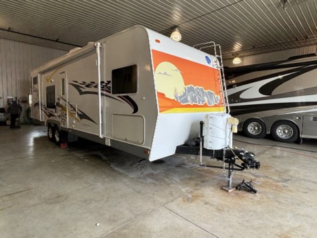 &lt;p&gt;Toy Hauler Travel Trailer&amp;nbsp; equipped with ducted roof A/C , 5500 watt Onan generator , 24&quot; TV , TV antennas , Dbl door Ref/Freezer , 3 burner gas range w/oven , microwave oven , power roof ventilators front and rear , AM/FM/DVD radio , Patio awning , Stab. jacks , power frt tonque jack , Aluminum wheels , Pro Pride equalizer hitch , Dual battery pack , Rear ladder ,&amp;nbsp;&lt;/p&gt;