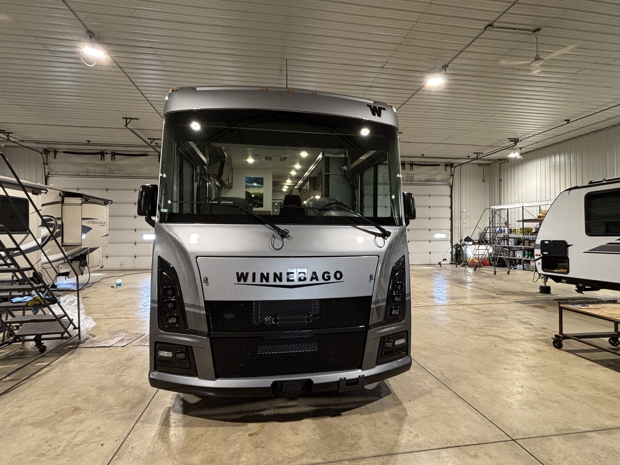 2025 Winnebago Vista NPF 29  V - New Class A For Sale by Winnebago Motor Homes in Rockford, Illinois features Leveling Jacks, Backup Monitor, Smoke Detector, Ladder, Battery Charger