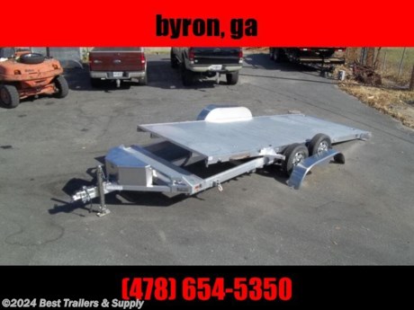 only 1500# curb weight on this aluminum 82 x 18 tilt carhauler trailer

-power tilt option
tool box
w battery

all new model

* Bed locks for travel and also wheel tilted back
* about 9 Degrees of tilt
*

2. 3500# Rubber torsion axles - Easy lube hubs

* Electric brakes, breakaway kit
* ST205/75R14 LRC Carlisle radial tires (1760# cap/tire)
* Phantom aluminum wheels, 5-4.5 BHP
* Removable aluminum fenders
* Extruded aluminum floor
* Front retaining rail headache bar
* A-Framed aluminum tongue, 48&quot; long with 2-5/16&quot; coupler
*

8. stake pockets on sides

*

4. swivel tie downs

*

2. Fold-down rear stabilizer jacks

* Double-wheel swivel tongue jack, 1200# capacity
* DOT Lighting package, safety chains
* Overall width = 101-1/2&quot;
* Distance between fenders = 82&quot;