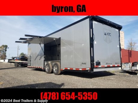 ## best trailers and supply

### 478-654-5350

###

Race ready 28 ft carhauler trailer RoM 500
rubber floor
base and overhead cabinets
race lights outside
premium escape door
generator box
electrical
4 drings
deluxe interior pkg
spoiler
lights
pull out step

Axle Rating (2) 7000 lb
GVWR 1400 lb
Axle Type Torsion
Overall Length (Includes 6&quot; Spoiler) 28&#39; 10&quot;
Overall Width 102&quot;
Overall Height (Top of Roof Vent) 112 3/4&quot;
Interior Length 23&#39; 11&quot;
Interior Width 97 1/2&quot;
Interior Height 84&quot;
Minimum Ground Clearance 8 1/16&quot;
Deck Height 19 3/4&quot;
Rear Opening Width 89 7/8&quot;
Rear Opening Height 83 7/8&quot;
Tongue Length to Center of Ball 55 1/2&quot;
Center of Coupler to Corner Radius 78 1/2&quot;
Width Between Wheel Wells 82&quot;
Brakes 4 Wheel Electric
Tire Size/Tire Load Range 225/75R15 LRD
Hitch Height To Top of Ball 19&quot;
Hitch Ball Size 2 5/16&quot;
Floor Studs 16&quot; OC
Wall Studs 16&quot; OC
Ceiling Studs 16&quot; OC

## best trailers and supply

### 478-654-5350

&#160;