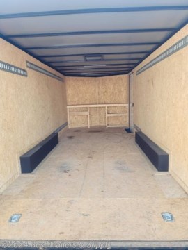 **Best Trailers &amp; Supply**
**Byron GA**
**866-553-9566**

ECCW8518-71700 2023 USED trade in great deal

Up grades on this trailer 8.5x18

6&#39;6&quot; interior
Semi-Screwless
Radial Tires
-Trim
-Rock Guard
knife edge ramp

Standard Features

V-nose adds 2ft to interior
15&#39;&#39; Bias Ply Tires
Silver Mod Wheels
32&quot; RV Style Side Door With Flush Lock
Rounded V-Nose with Vertical ATP Trim
Barn or Ramp Door
3500LB Spring Axles with 4&quot; Drop and EZ Lube Hubs
24&quot; Stoneguard
White Metal Exterior
2&quot; or 2 - 5/16&quot; Coupler
Aluminum Fenders w/ Lights
3/4&quot; Plywood Floor / Painted Underneath
Premium 3/8&quot; Plywood Sidewalls
1&quot; x 1.5&quot; Tubing Walls and Ceiling

75&quot; Interior Height
2000 LB Tongue Jack
2&quot; x 4&quot; Steel Tube Main Rails
12 V Dome Lights with Switch
Choice Of Roof Or Sidewall Vent
LED Strip Tail Lights
Wall Crossmembers 16&quot; On Center
Floor Crossmembers 16&quot; On Center
Roof Crossmembers 24&quot; On Center
Screwed Metal Exterior
Galvalume Roof
4 or 7-Way Round Electrical Plug

**800-453-1810**

Any questions, concerns, or Info on this trailer, please call our sales team

delv is $2 per loaded mile

Please call to check stock

**800-453-1810**