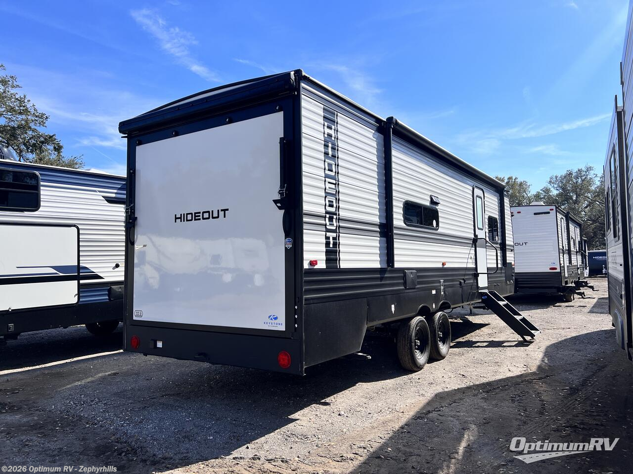 2025 Keystone Hideout 26PATIO - New Travel Trailer For Sale by Optimum RV - Zephyrhills in Zephyrhills, Florida features Slideout, Awning