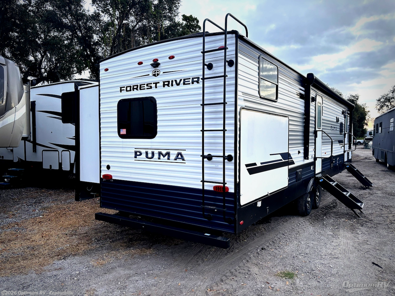 2025 Palomino Puma 31QBBH - Used Travel Trailer For Sale by Optimum RV - Zephyrhills in Zephyrhills, Florida features Slideout, Awning