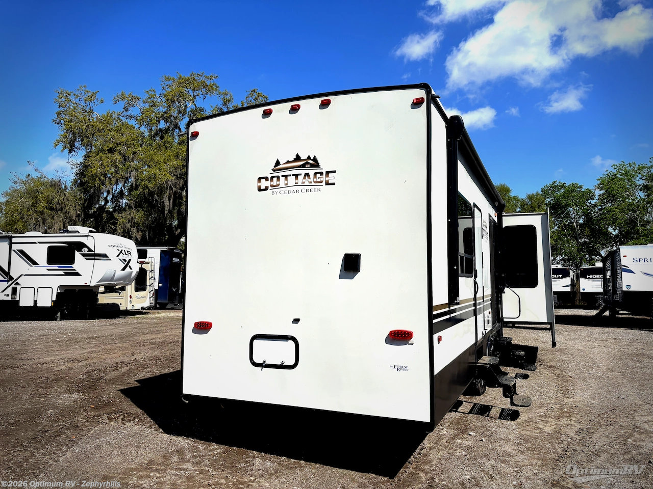 2023 Forest River Cedar Creek Cottage 40CCK - Used Destination Trailer For Sale by Optimum RV - Zephyrhills in Zephyrhills, Florida features Slideout, Awning