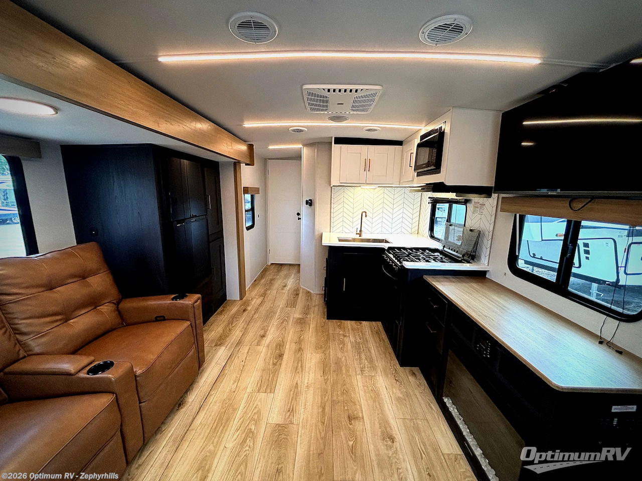 2025 Heartland North Trail 26RLX - Used Travel Trailer For Sale by Optimum RV - Zephyrhills in Zephyrhills, Florida features Awning, Slideout