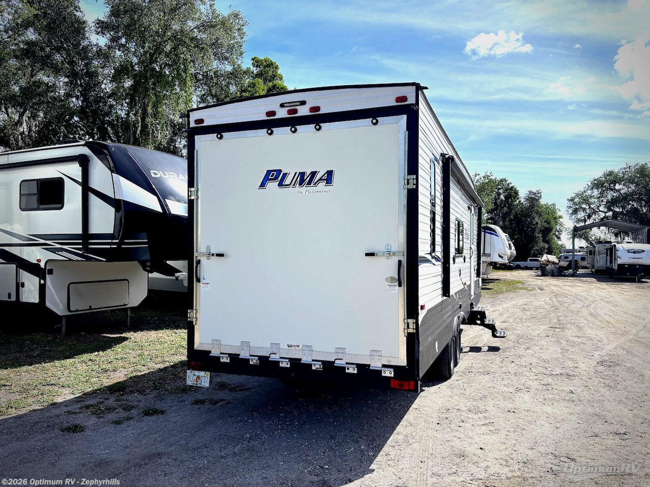 2019 Palomino Puma XLE Lite 27QBC - Used Travel Trailer For Sale by Optimum RV - Zephyrhills in Zephyrhills, Florida features Awning