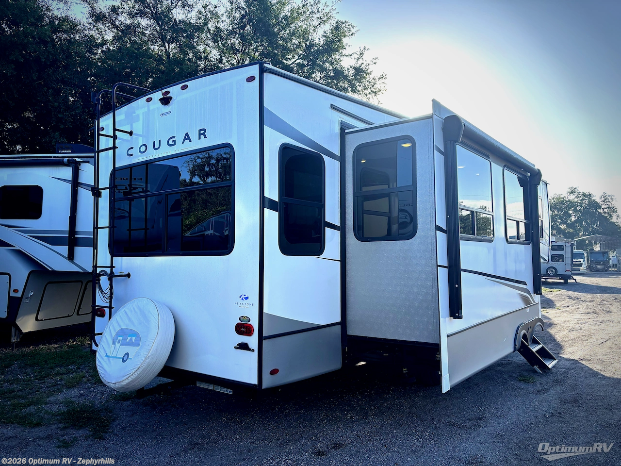 2023 Keystone Cougar 316RLS - Used Fifth Wheel For Sale by Optimum RV - Zephyrhills in Zephyrhills, Florida features Awning, Slideout