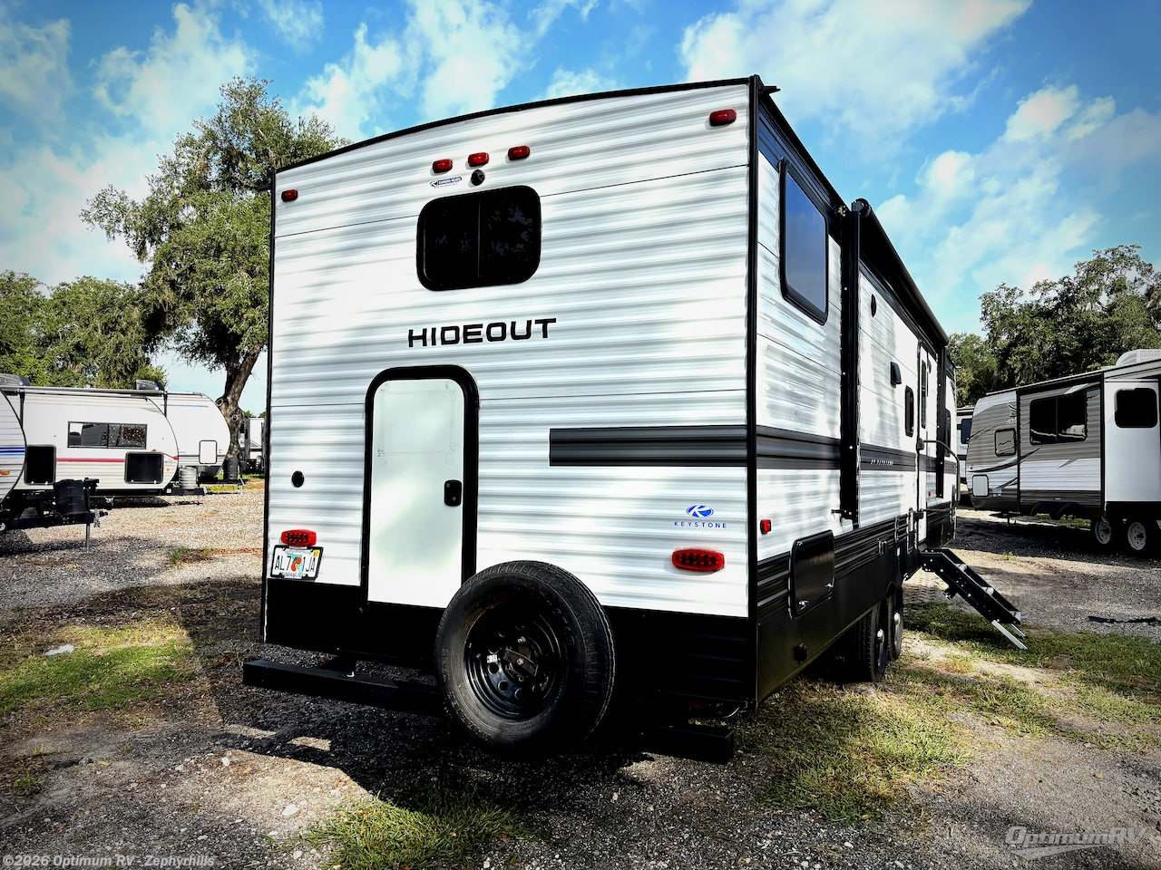 2022 Keystone Hideout 32LBH - Used Travel Trailer For Sale by Optimum RV - Zephyrhills in Zephyrhills, Florida features Awning, Slideout