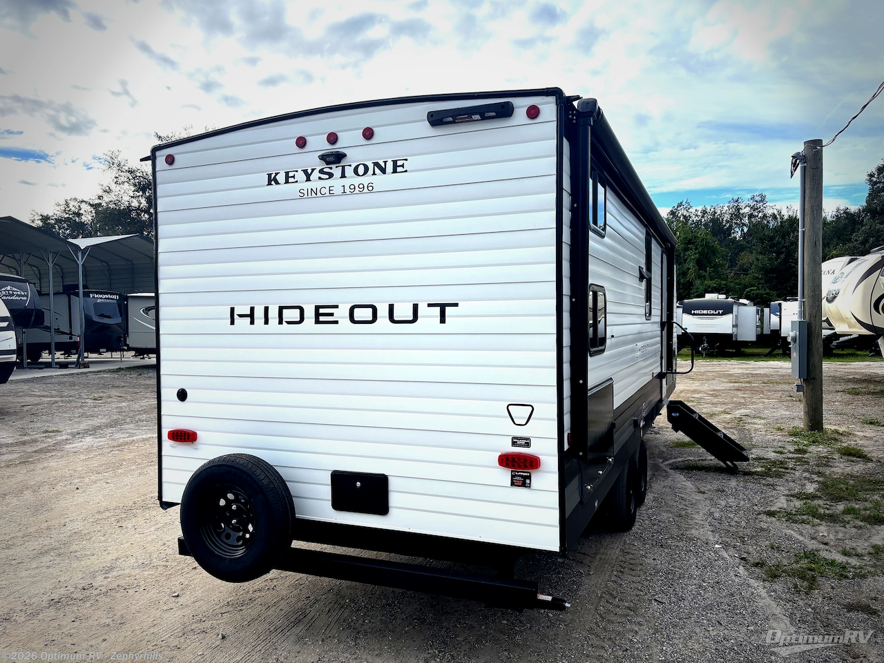 2027 Keystone Hideout 262BHS - New Travel Trailer For Sale by Optimum RV - Zephyrhills in Zephyrhills, Florida features Slideout, Awning