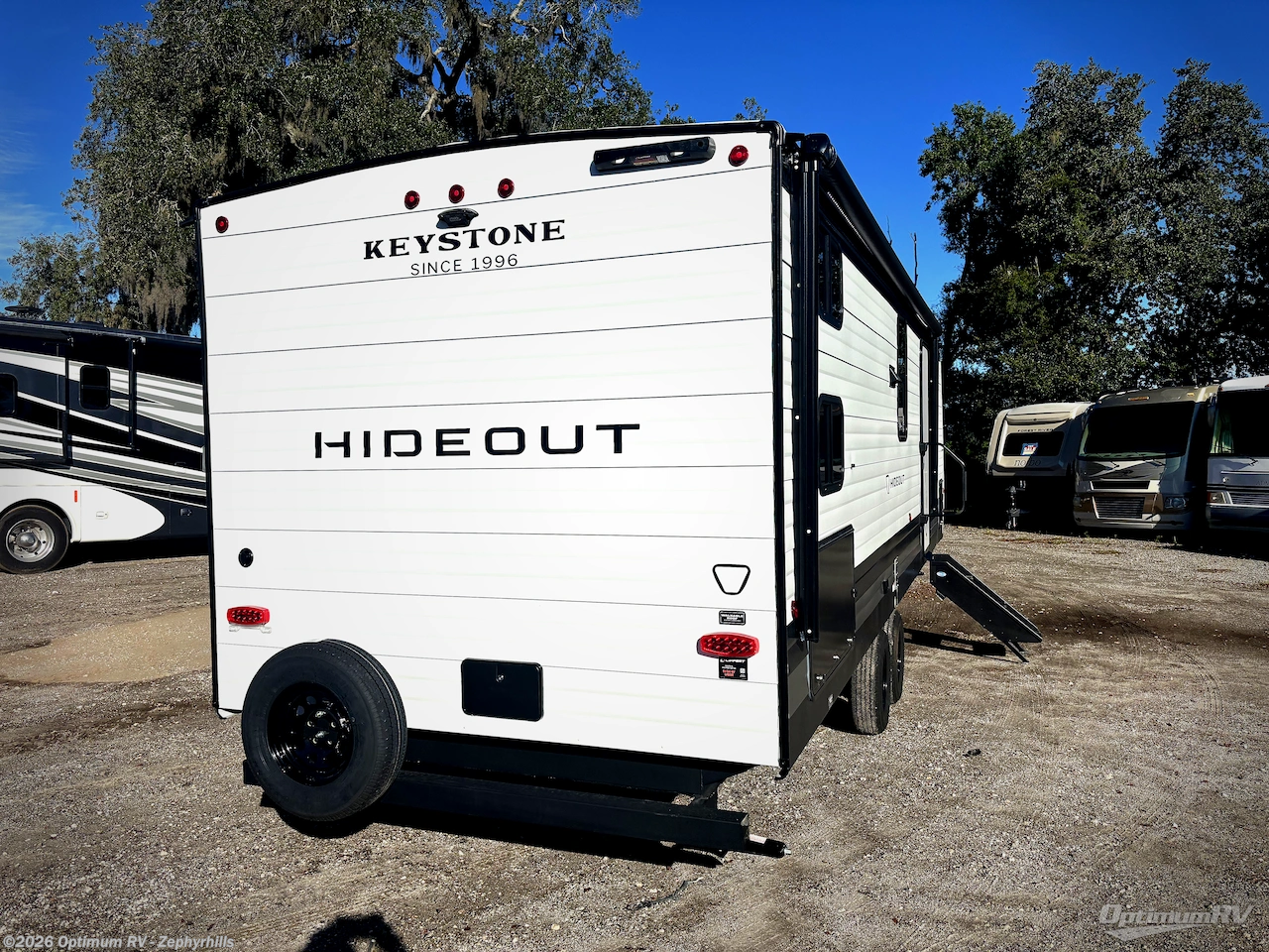 2027 Keystone Hideout 262BHS - New Travel Trailer For Sale by Optimum RV - Zephyrhills in Zephyrhills, Florida features Slideout, Awning