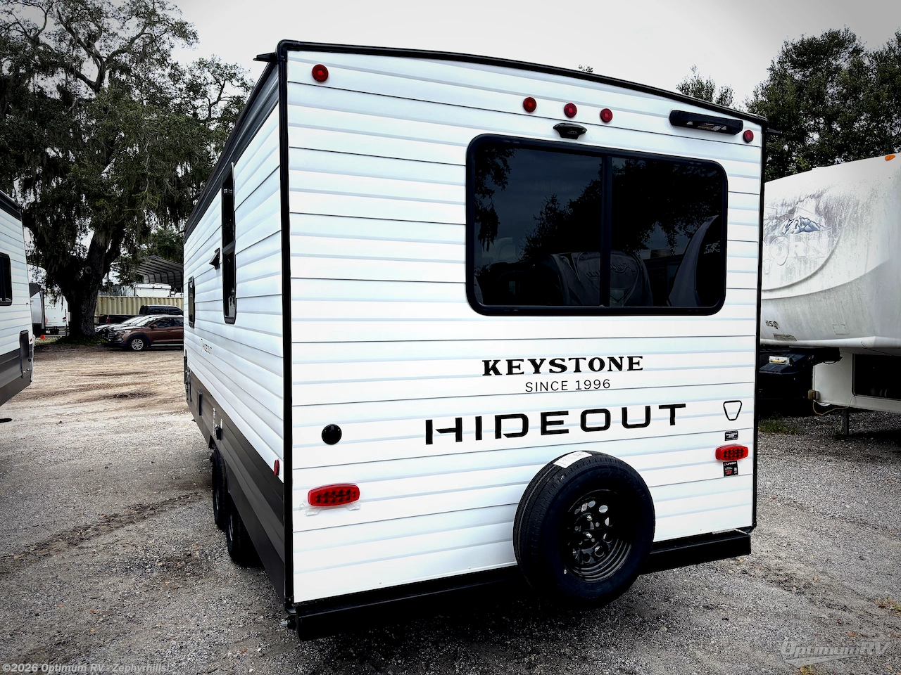 2027 Hideout 210RL by Keystone from Optimum RV - Zephyrhills in Zephyrhills, Florida