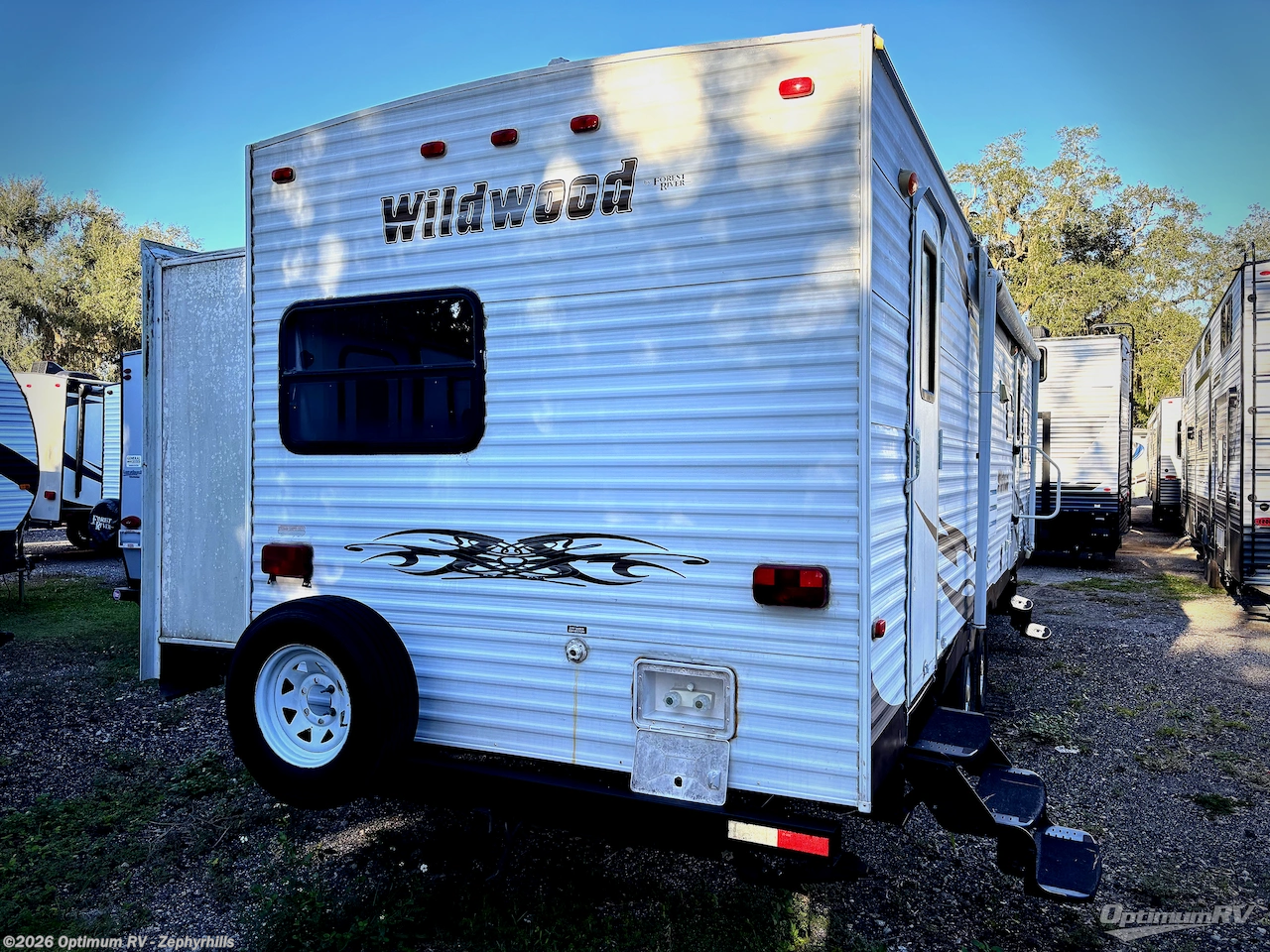 2010 Forest River Wildwood 29BHBS - Used Travel Trailer For Sale by Optimum RV - Zephyrhills in Zephyrhills, Florida features Slideout
