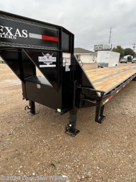 40,000 lbs GVWR!!!&lt;br&gt; &lt;br&gt; 40,000 LB G.V.W.R.&lt;br&gt;2-15K DEXTER AXLES 2 ELEC. BRAKES&lt;br&gt;LOW PROFILE&lt;br&gt;HUTCH SUSPENSION&lt;br&gt;17.5&quot; 8 HOLE DUAL WHEELS&lt;br&gt;ST215/75/R17.5 16 PLY RADIAL TIRES&lt;br&gt;12&quot; 22 LB I-BEAM FRAME&lt;br&gt;12&quot; 22 LB I-BEAM NECK&lt;br&gt;TORQUE TUBE &lt;br&gt;BRIDGE FRAME &lt;br&gt;&lt;br&gt;2-5/16&quot; ROUND ADJUSTABLE COUPLER&lt;br&gt;3&quot; CHANNEL CROSSMEMBERS ON 16&quot; CENTERS&lt;br&gt;2-2 SPD JOIST JACKS&lt;br&gt;TREATED WOOD FLOOR&lt;br&gt;FRONT TOOLBOX BETWEEN RISERS&lt;br&gt;8&#39; SLIDE IN RAMPS W/4&quot; CHANNEL&lt;br&gt;STAKE POCKETS, PIPE SPOOLS &amp;amp; RUB RAIL&lt;br&gt;ST215/75/R17.5 16 PLY RADIAL SPARE TIRE&lt;br&gt;DRIVER SIDE STEP&lt;br&gt;7 WAY RV PLUG-IN&lt;br&gt;FLUSH MOUNT LED LIGHTS&lt;br&gt;1 COAT OF PRIMER AND 2 COATS OF POLYURETHANE PAINT (PAINTED UNDERNEATH)&lt;br&gt;BLACK COLORThe Advertised Prices DO NOT Include: *Licensing* &amp;amp; Tax&lt;br&gt;&lt;br&gt;We have over 200 trailers to choose from. Come in and see us at:&lt;br&gt;6610 N I-35 Lacy Lakeview, TX 76705 (Exit 342B)&lt;br&gt;&lt;br&gt;Not in the great state of Texas? No Problem! We offer local and nation wide delivery.&lt;br&gt;&lt;br&gt;Store Hours:&lt;br&gt;MON–FRI: 8:00 AM - 5:00 PM&lt;br&gt;SATURDAY: 9:00 AM - 2:00 PM&lt;br&gt;SUNDAY: Closed&lt;br&gt;&lt;br&gt;Remember we handle all your Trailer Sales &amp;amp; Trailer Part Needs!!!&lt;br&gt;Let us help you with servicing your trailer too!&lt;br&gt;It is our pleasure to serve our community of Waco Texas and all of Central Texas! http://www.lonestartrailers.com/--xInventoryDetail?id=12988658