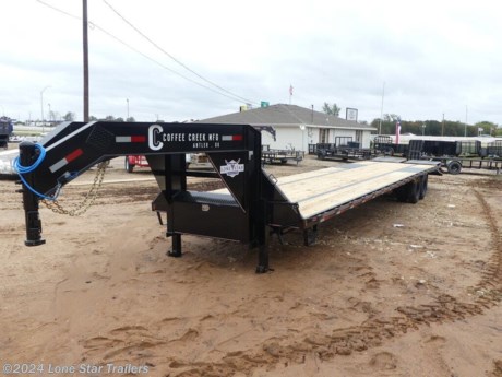 Coffee Creek Model: (GH) Tandem Dual &lt;br&gt;Coupler – 2 5/16&amp;#8221; round adjustable 25,000 lb&lt;br&gt;Jack – (2) spring loaded drop leg 10k jacks&lt;br&gt;Safety Chains – 3/8&amp;#8221; x 35&amp;#8221; with retainer&lt;br&gt;Tongue – 12&amp;#8221; x 19# I-beam&lt;br&gt;Frame – 12&amp;#8221; x 19# I-beam (Pierced)&lt;br&gt;Outer Frame – 5&amp;#8221; Channel&lt;br&gt;Rubrail – 2&amp;#8221;x3/8&amp;#8221; Flat with pipe spools&lt;br&gt;Crossmembers – 3&amp;#8221; channel on 16&amp;#8221; centers&lt;br&gt;Axle – (2) 10,000 lb Lippert brakes&lt;br&gt;Suspension – 6 leaf slipper spring&lt;br&gt;Tires – 235/80/R16 10 ply black mod nitrogen filled&lt;br&gt;Wheels – 16&amp;#8221; 8 on 6.5&lt;br&gt;Fenders – Floor plate over wheels&lt;br&gt;Flooring – 2x8 treated #2 pine&lt;br&gt;Ramp – (2) Standard Spring ramps with center pop up&lt;br&gt;Toolbox – Front locking toolbox in neck&lt;br&gt;Bridge Frame&lt;br&gt;** Dove w/ Mega Ramps&lt;br&gt;&lt;br&gt;The Advertised Prices DO NOT Include: *Licensing* &amp;amp; Tax&lt;br&gt;&lt;br&gt;We have over 200 trailers to choose from. Come in and see us at:&lt;br&gt;6610 N I-35 Lacy Lakeview, TX 76705 (Exit 342B)&lt;br&gt;&lt;br&gt;Not in the great state of Texas? No Problem! We offer local and nationwide delivery.&lt;br&gt;&lt;br&gt;Store Hours:&lt;br&gt;MON–FRI: 8:00 AM - 5:00 PM&lt;br&gt;SATURDAY: 9:00 AM - 2:00 PM&lt;br&gt;SUNDAY: Closed&lt;br&gt;&lt;br&gt;Remember we handle all your Trailer Sales &amp;amp; Trailer Part Needs!!!&lt;br&gt;Let us help you with servicing your trailer too!&lt;br&gt;It is our pleasure to serve our community of Waco and all of Central Texas!&lt;br&gt; http://www.lonestartrailers.com/--xInventoryDetail?id=14713661