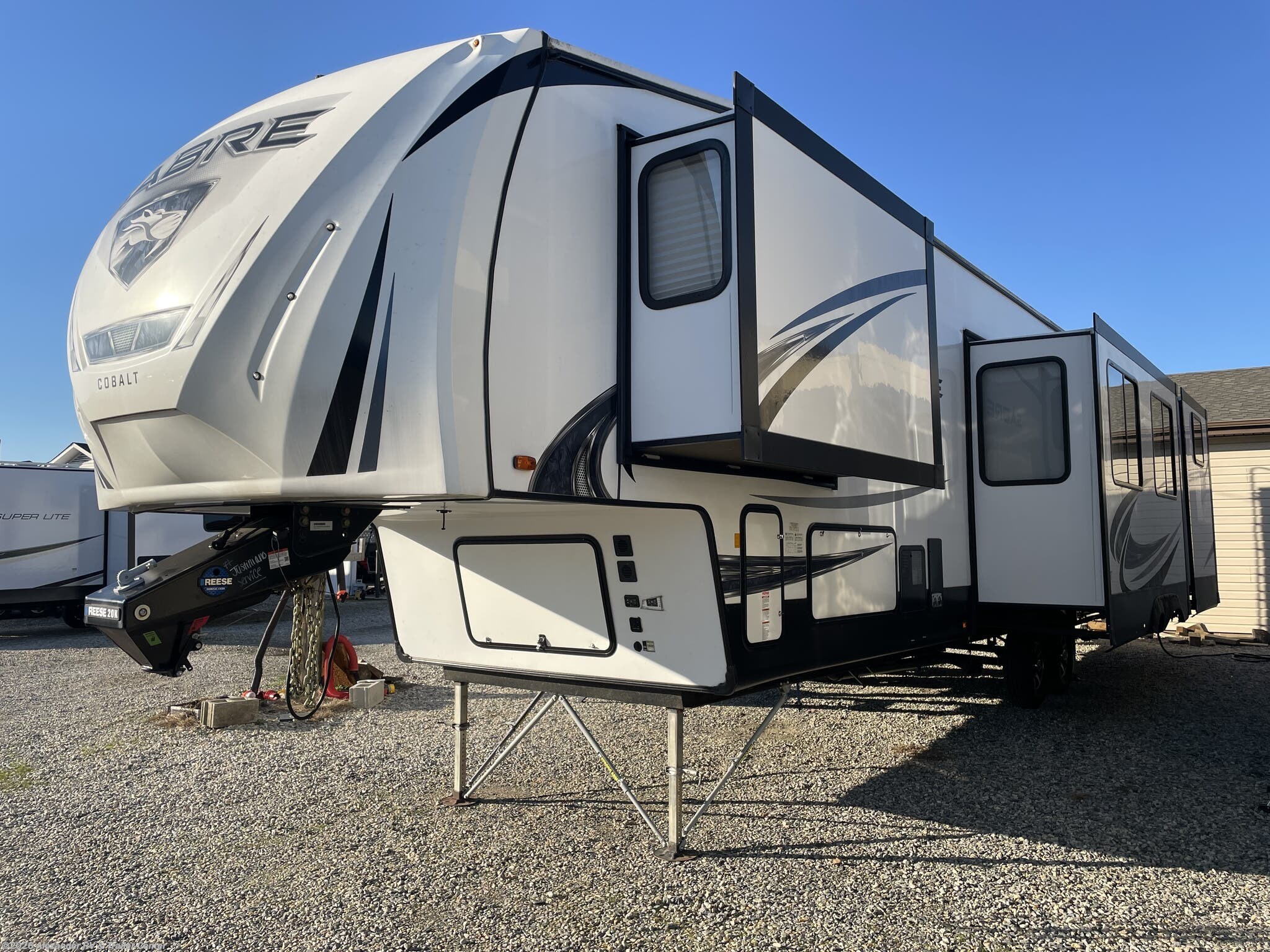 2020 Forest River Sabre 38DBQ **2 BEDROOM**2 FULL BATHROOMS**LOFT** - Used Fifth Wheel For Sale by Alexander RV & Trailer Center in Clayton, Delaware features Microwave, Table and Chairs, Water Heater, Toilet, Oven
