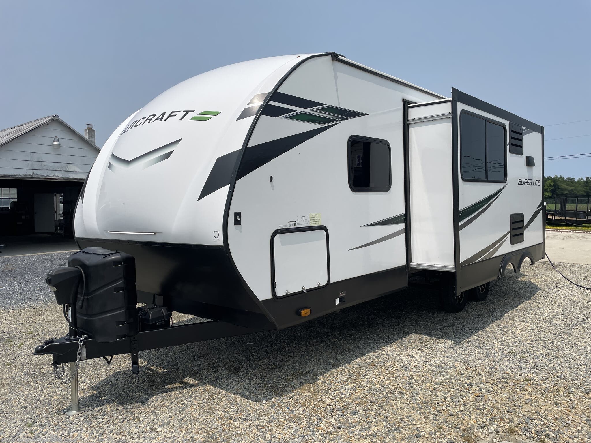2023 Starcraft Super Lite 225CK - Used Travel Trailer For Sale by Alexander RV & Trailer Center in Clayton, Delaware features Microwave, Stove Top Burner, Air Conditioning, Power Awning, Aluminum Entrance Steps