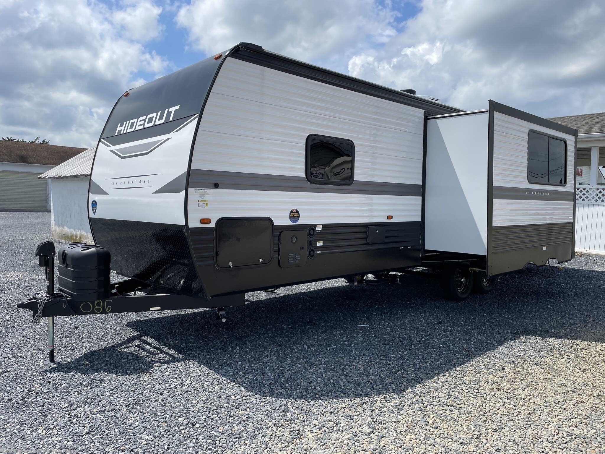 2025 Keystone Hideout East 28BUS - New Travel Trailer For Sale by Alexander RV & Trailer Center in Clayton, Delaware features Diamond Shield Paint Protection Film, TV Antenna, 30 Amp Service, Slideout, Skylight