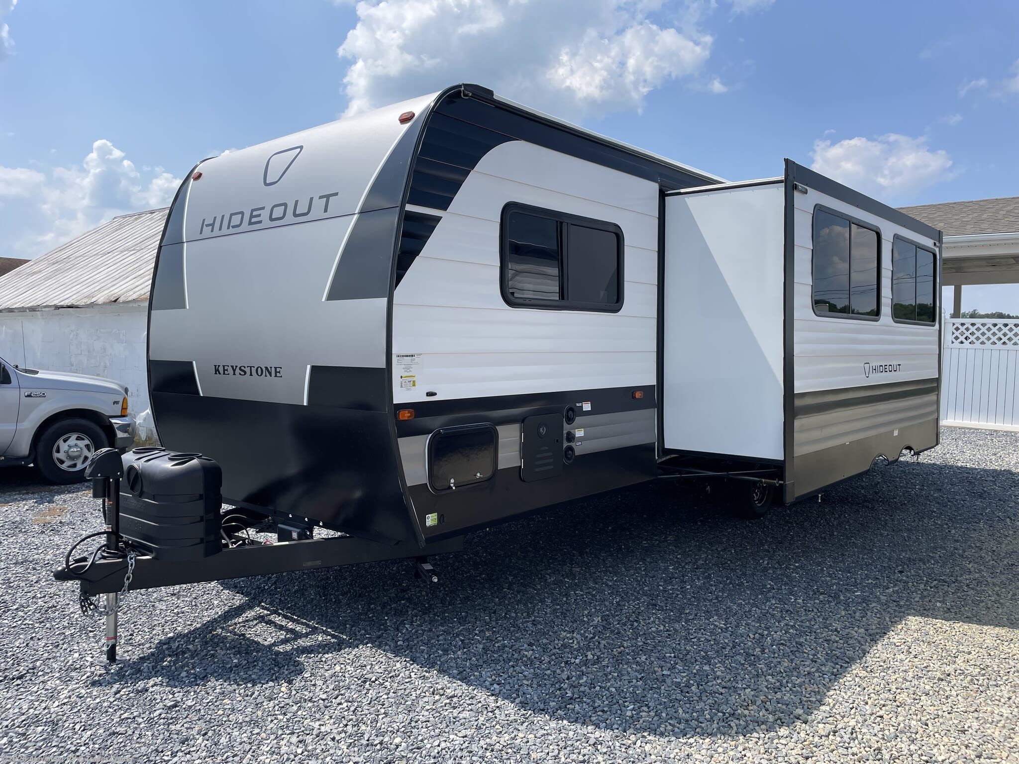 2026 Keystone Hideout Sport East 269DB - New Travel Trailer For Sale by Alexander RV & Trailer Center in Clayton, Delaware features Roof Vents, Power Awning, Toilet, Outside Kitchen, Diamond Shield Paint Protection Film
