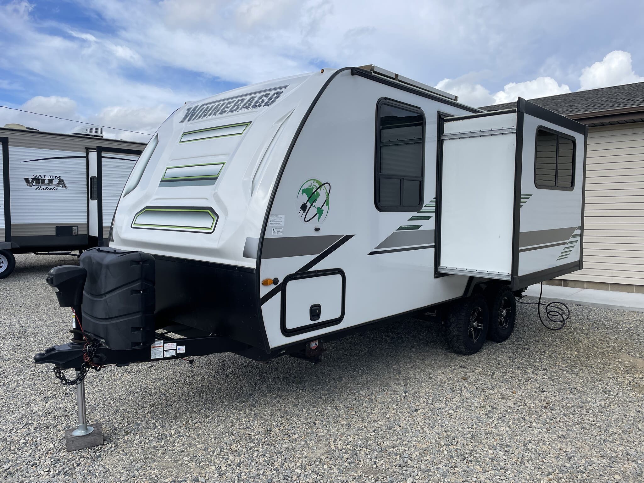 2022 Winnebago Micro Minnie FLX 2108FBS - Used Travel Trailer For Sale by Alexander RV & Trailer Center in Clayton, Delaware features Queen Bed, Pass Thru Storage, Power Stabilizer Jacks, Detachable Power Cord, Spare Tire Kit