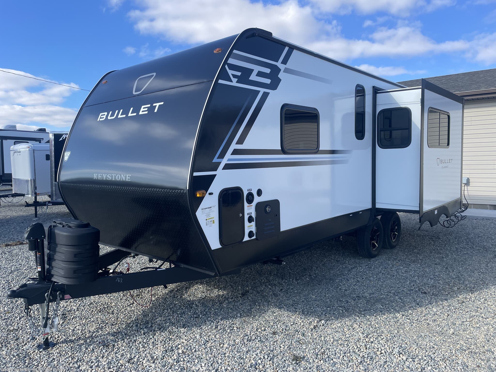 2026 Keystone Bullet Classic 21RKC - New Travel Trailer For Sale by Alexander RV & Trailer Center in Clayton, Delaware features Pass Thru Storage, Stove Top Burner, Enclosed Underbelly, Diamond Shield Paint Protection Film, Fiberglass Sidewalls