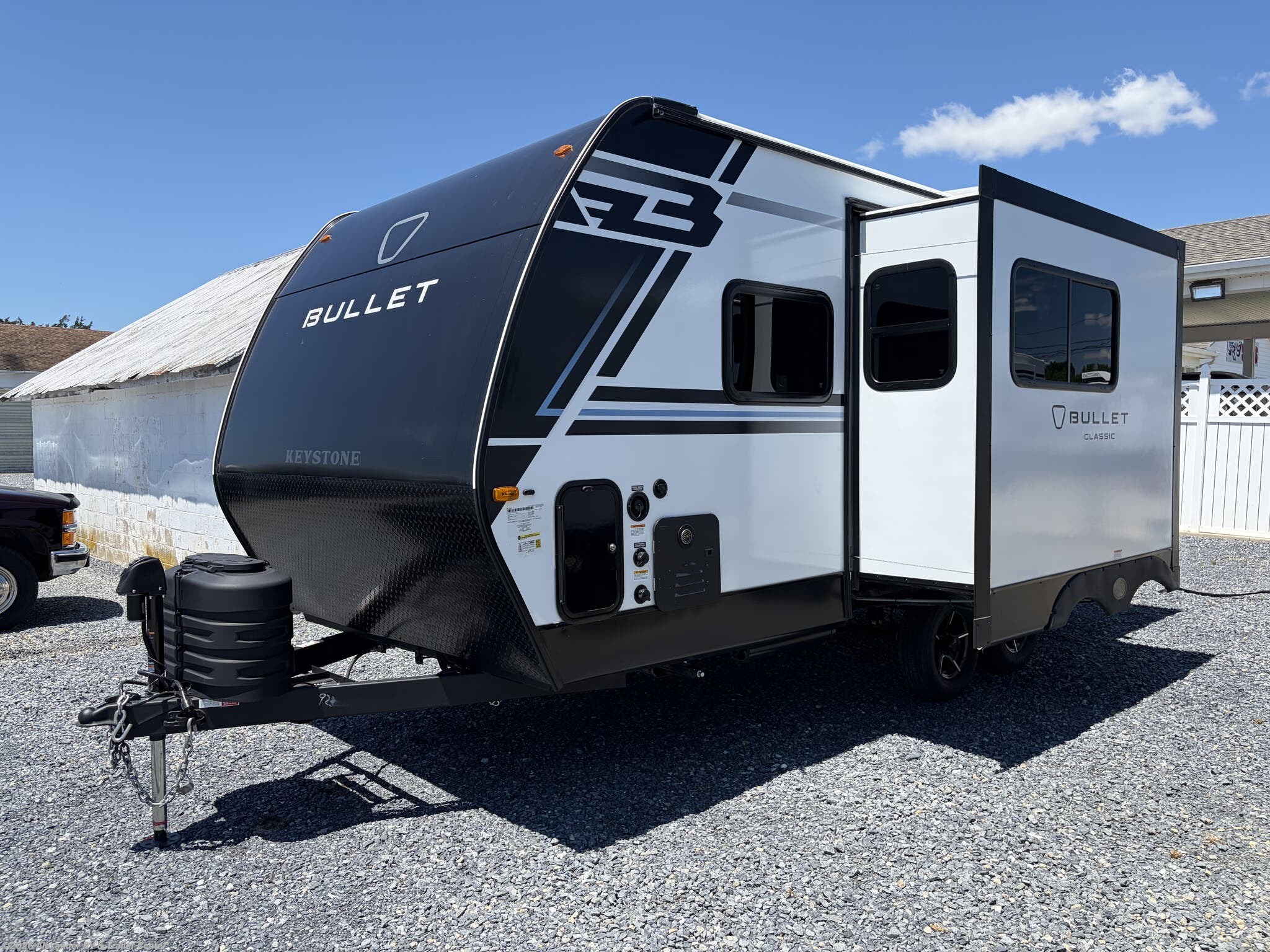 2026 Keystone Bullet Classic 18RBC - New Travel Trailer For Sale by Alexander RV & Trailer Center in Clayton, Delaware features Queen Bed, Aluminum Entrance Steps, Smoke Detector, Spare Tire Kit, Medicine Cabinet